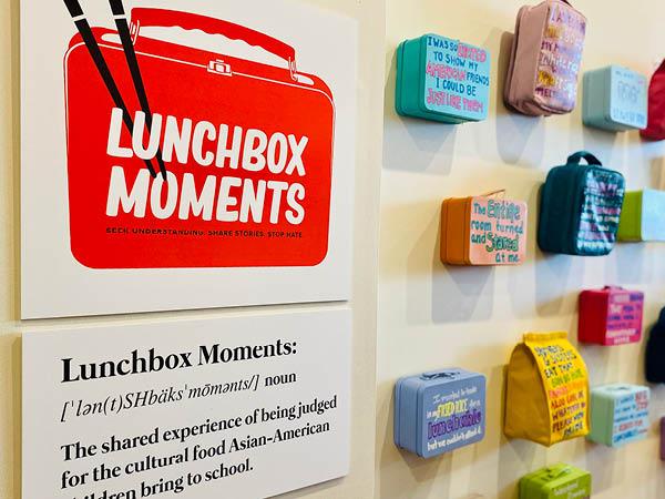 lunchboxes displayed on the gallery wall