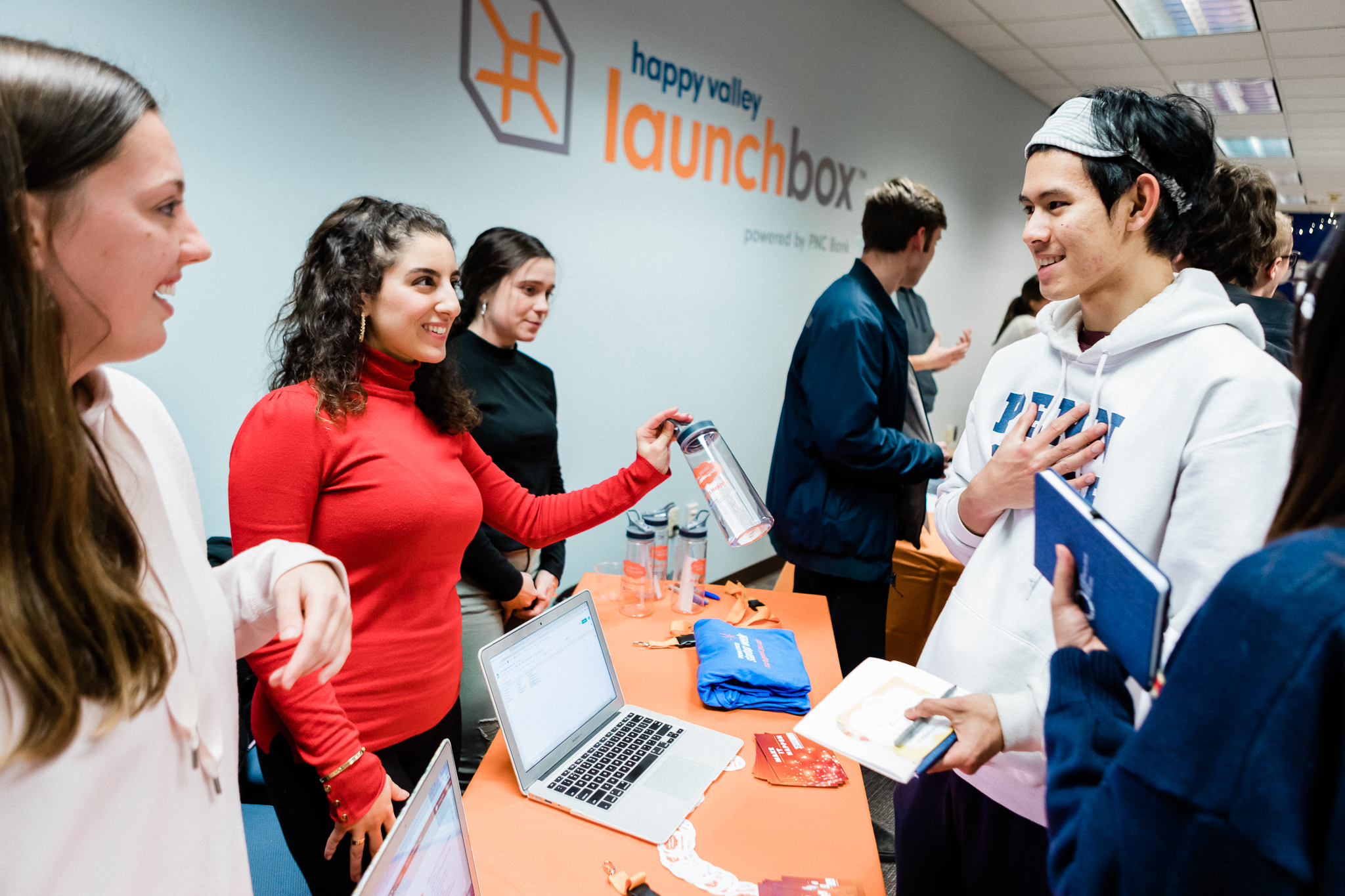 Students volunteers assist other students and community members at a GEW event at Happy Valley LaunchBox powered by PNC Bank