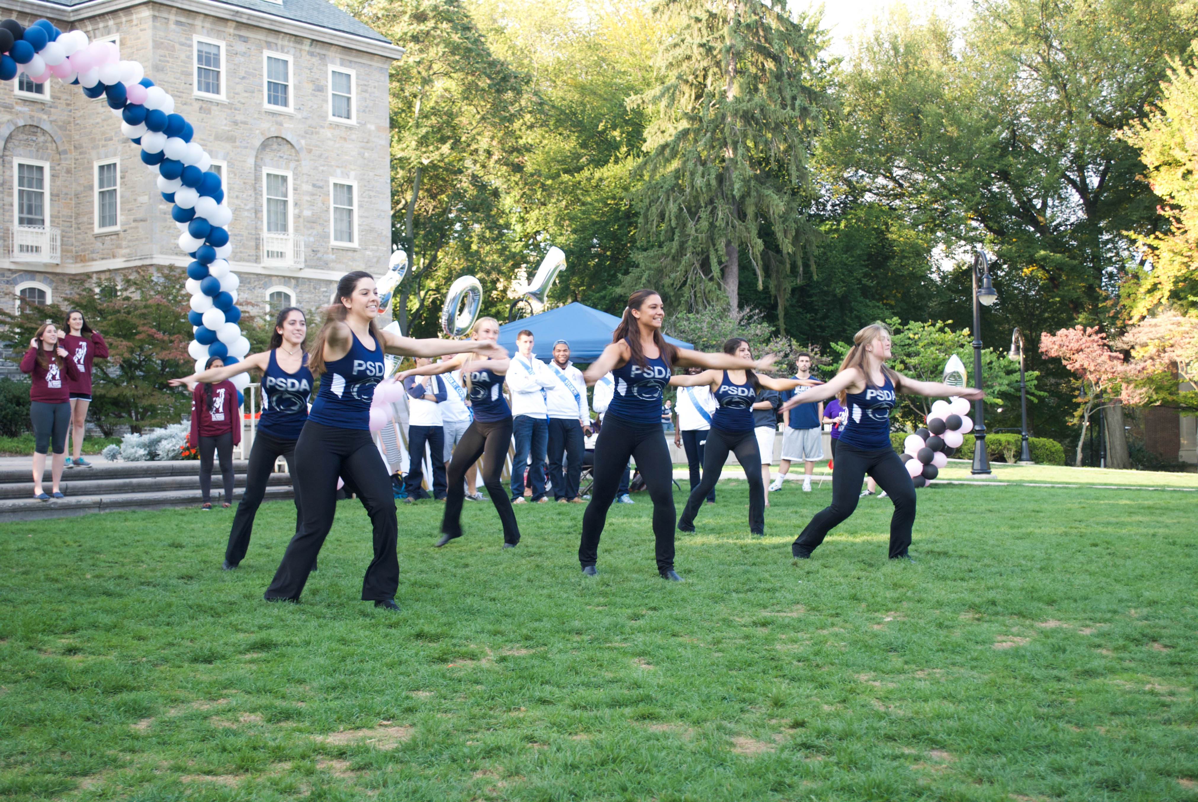 Students performing outside of Old Main