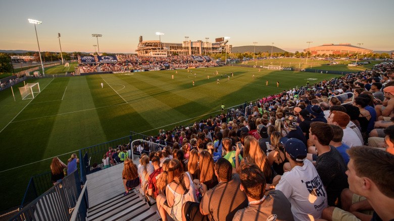 Crowd watches soccer match at Jeffrey Field