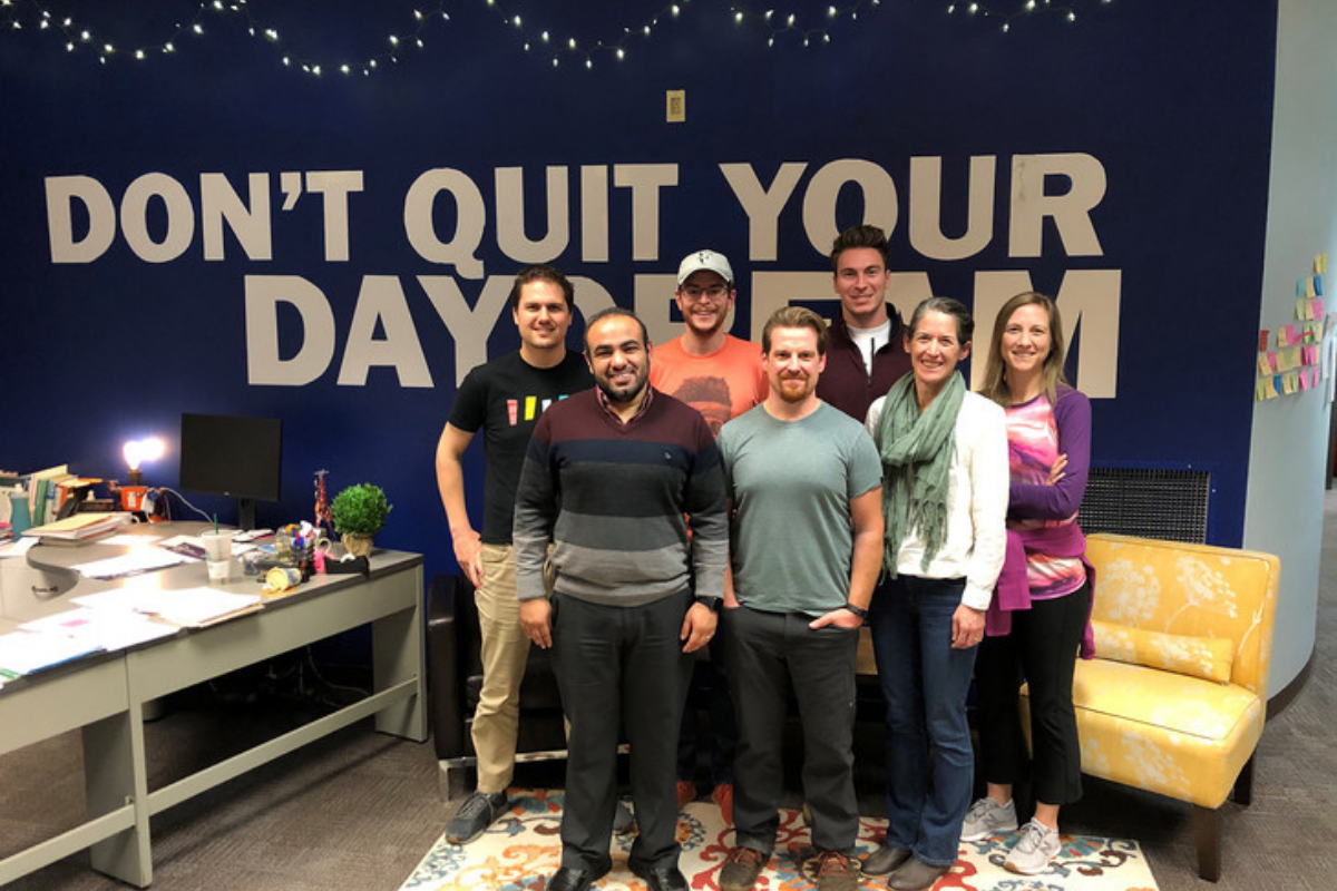 All seven of the 2019-20 FastTrack Accelerator participants stand together in the Happy Valley LaunchBox