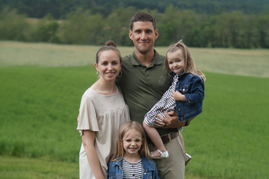 Benjamin Courter with his wife, Hillary, and their two children