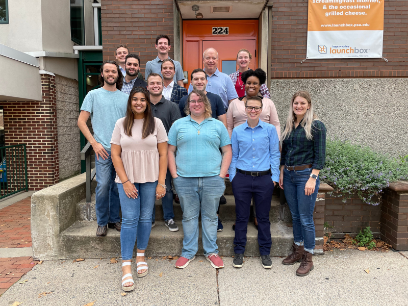 Penn State Law Clinic staff stand outside the old location for the Happy Valley LaunchBox powered by PNC Bank