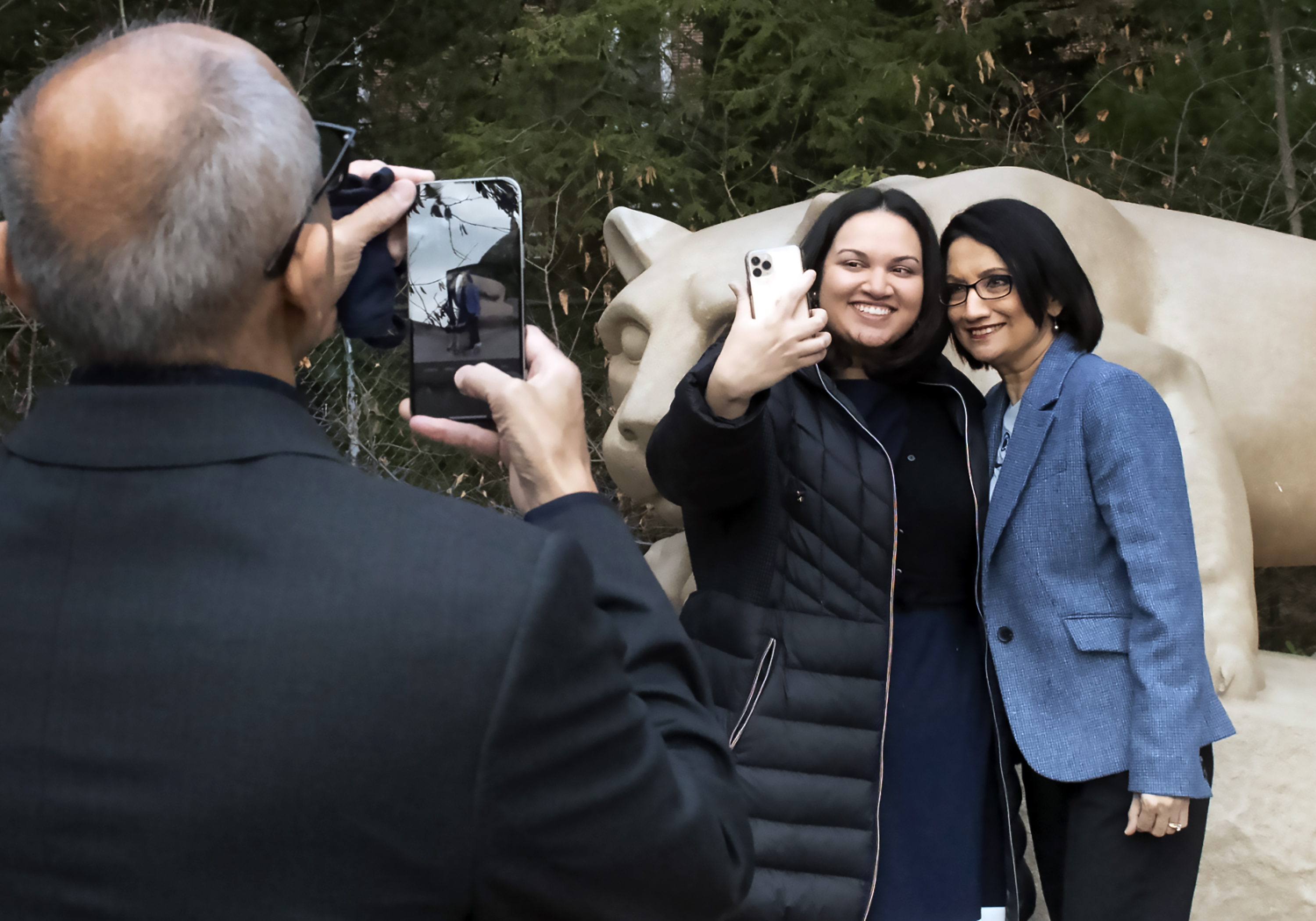 The Bendapudi family takes selfies at the Lion shrine