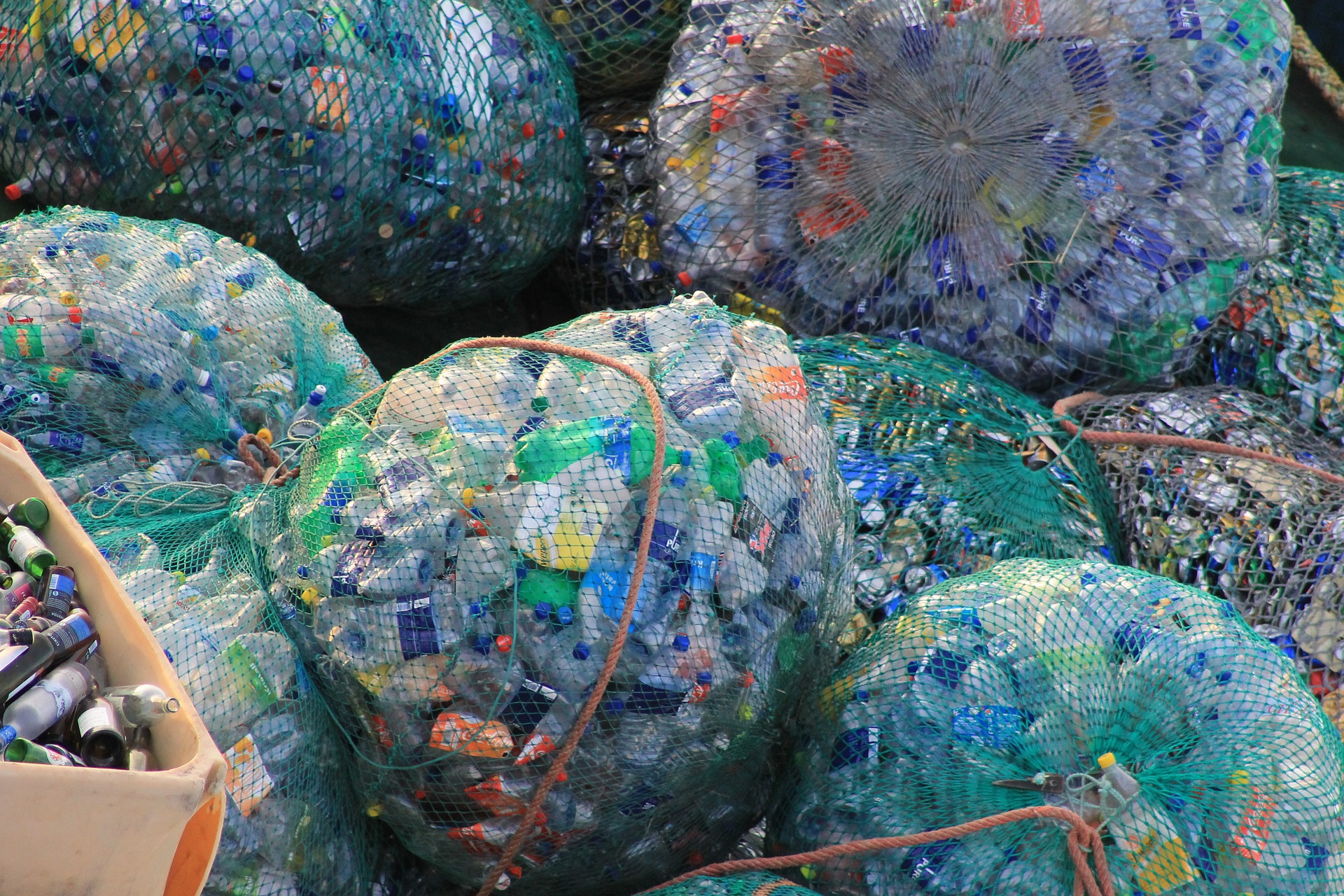 Piled bags full of empty plastic bottles