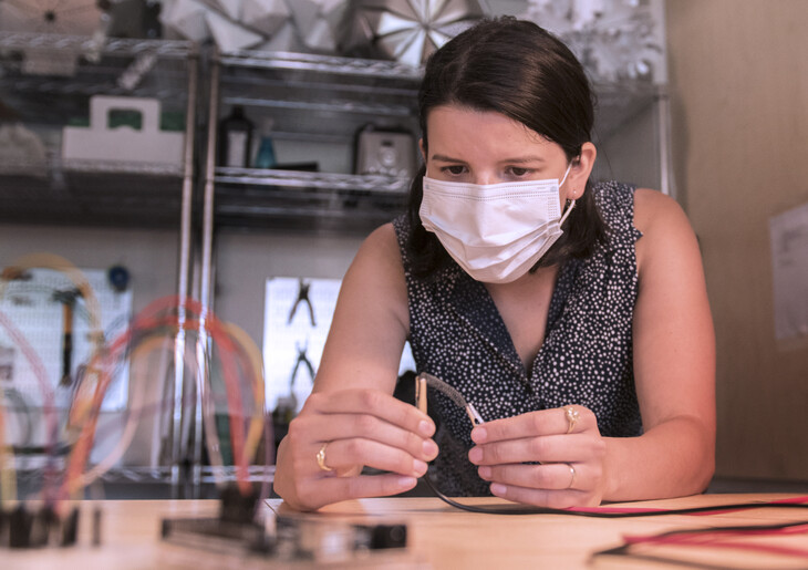 Elena Vazquez working at a desk in the Stuckeman Center for Design Computing