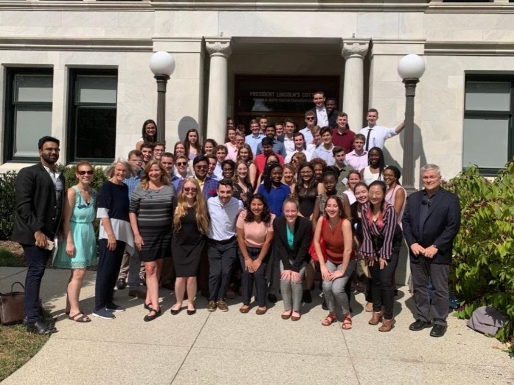 the 2019 presidential leadership academy cohort gathered outside a building in Washington D.C.