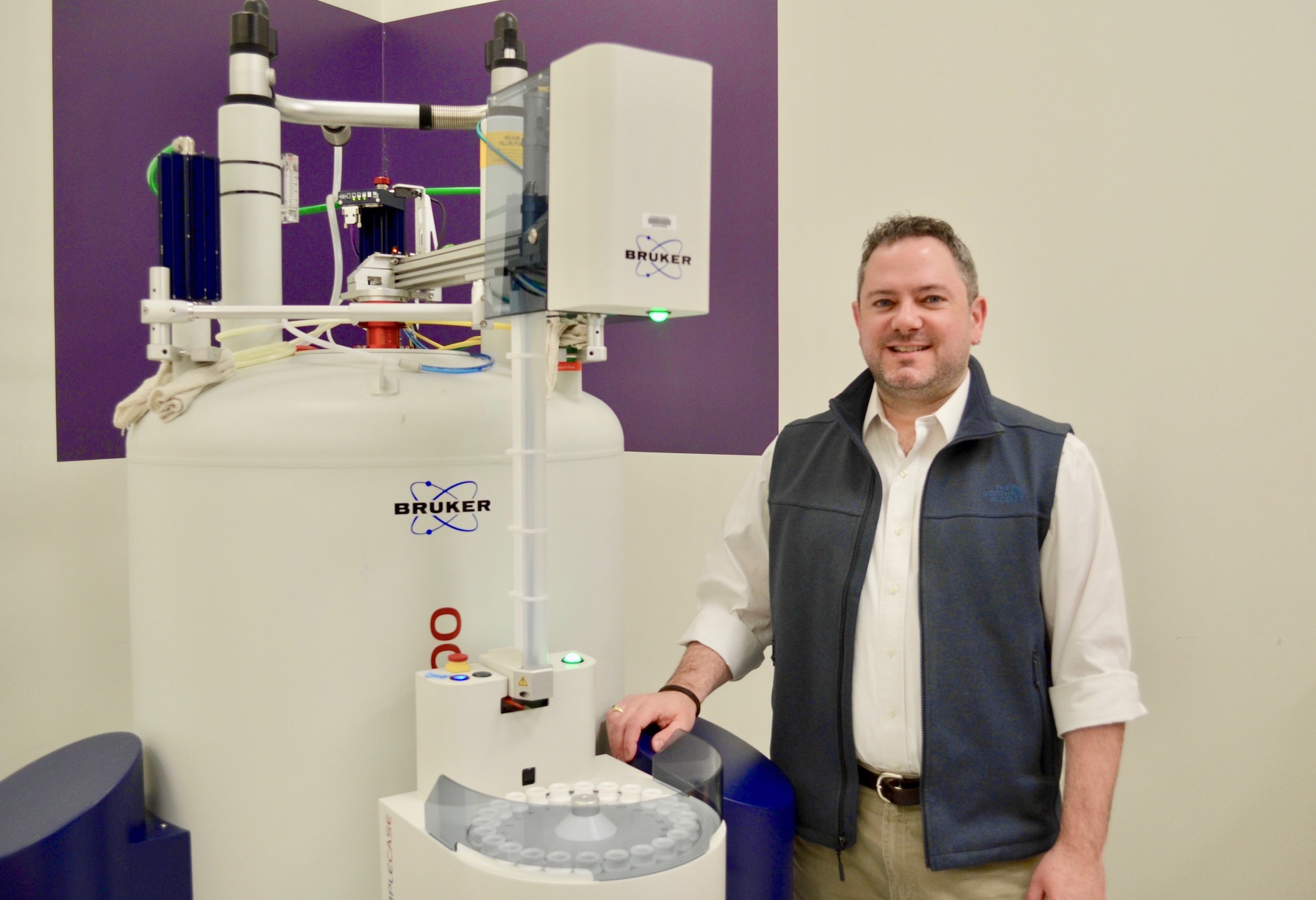 Scott Showalter in front of lab equipment