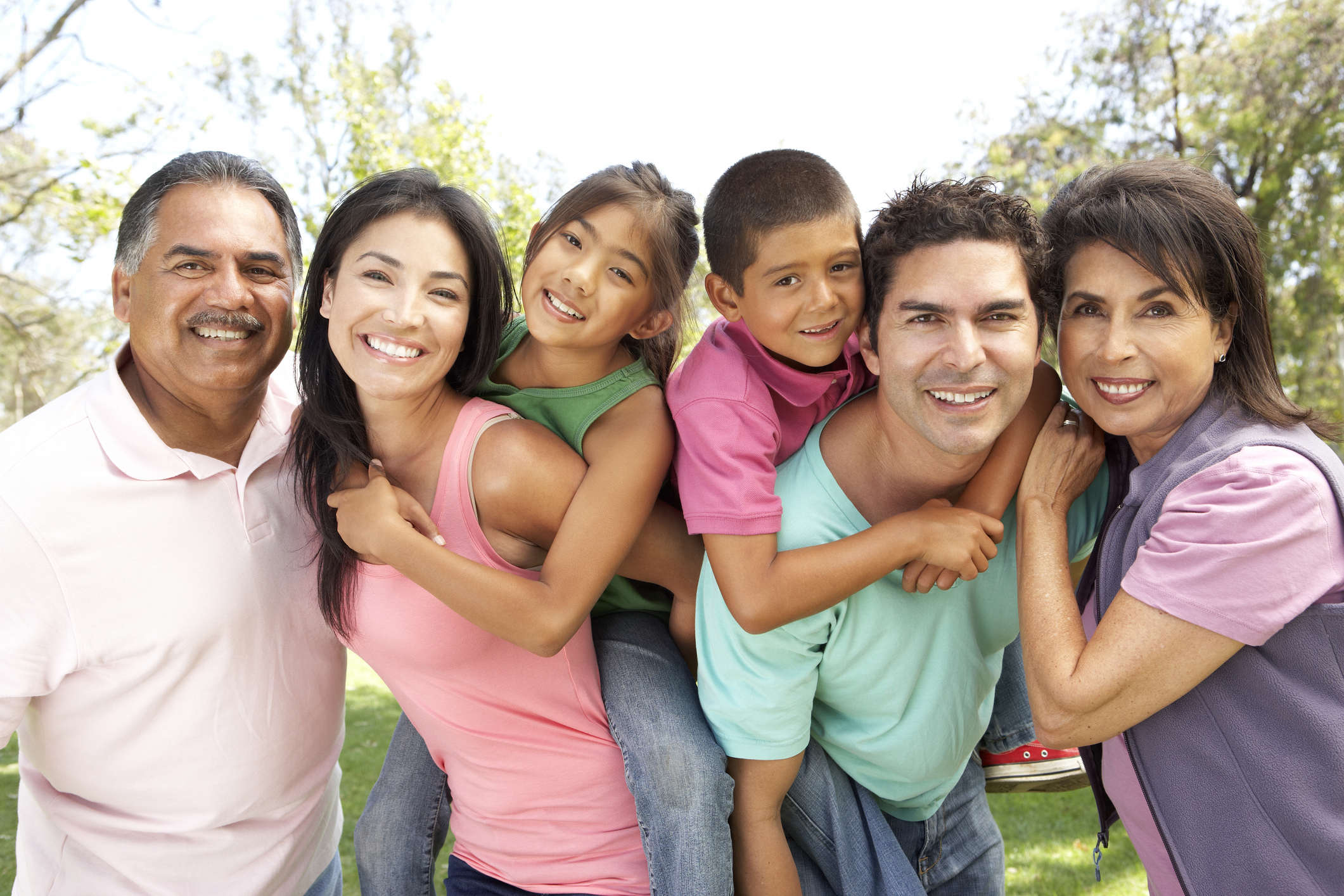 Several people of Hispanic/Latino decent who appear to be 3 generations of a family