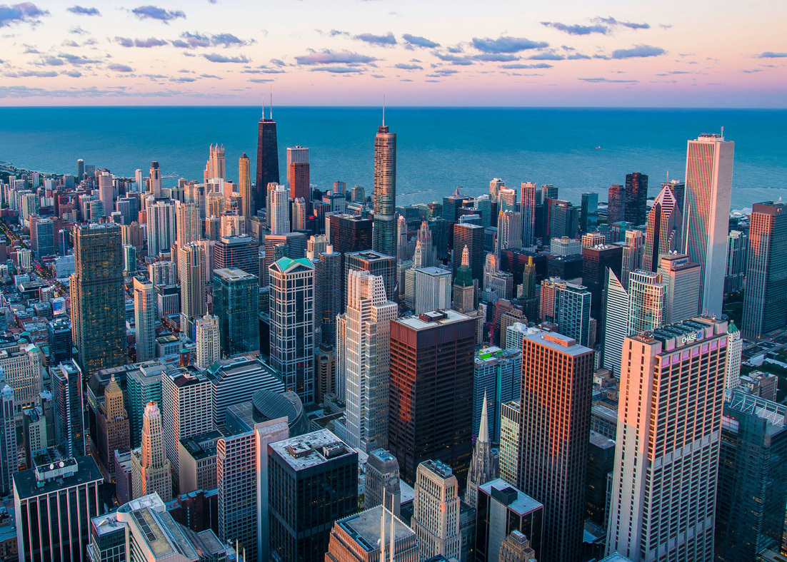 The skyline of Chicago shown at dusk. 