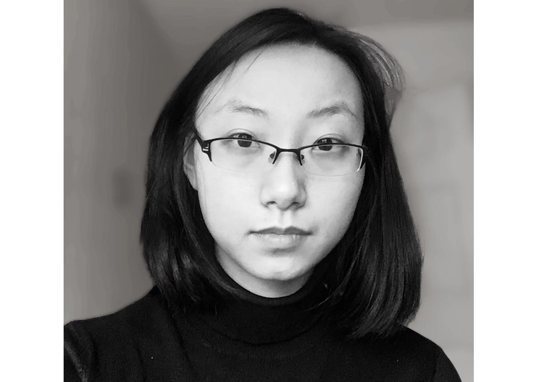 Black and white headshot of Xi Jin