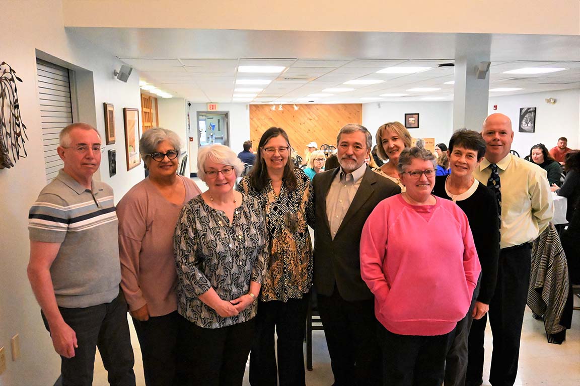 Group of retirees standing together