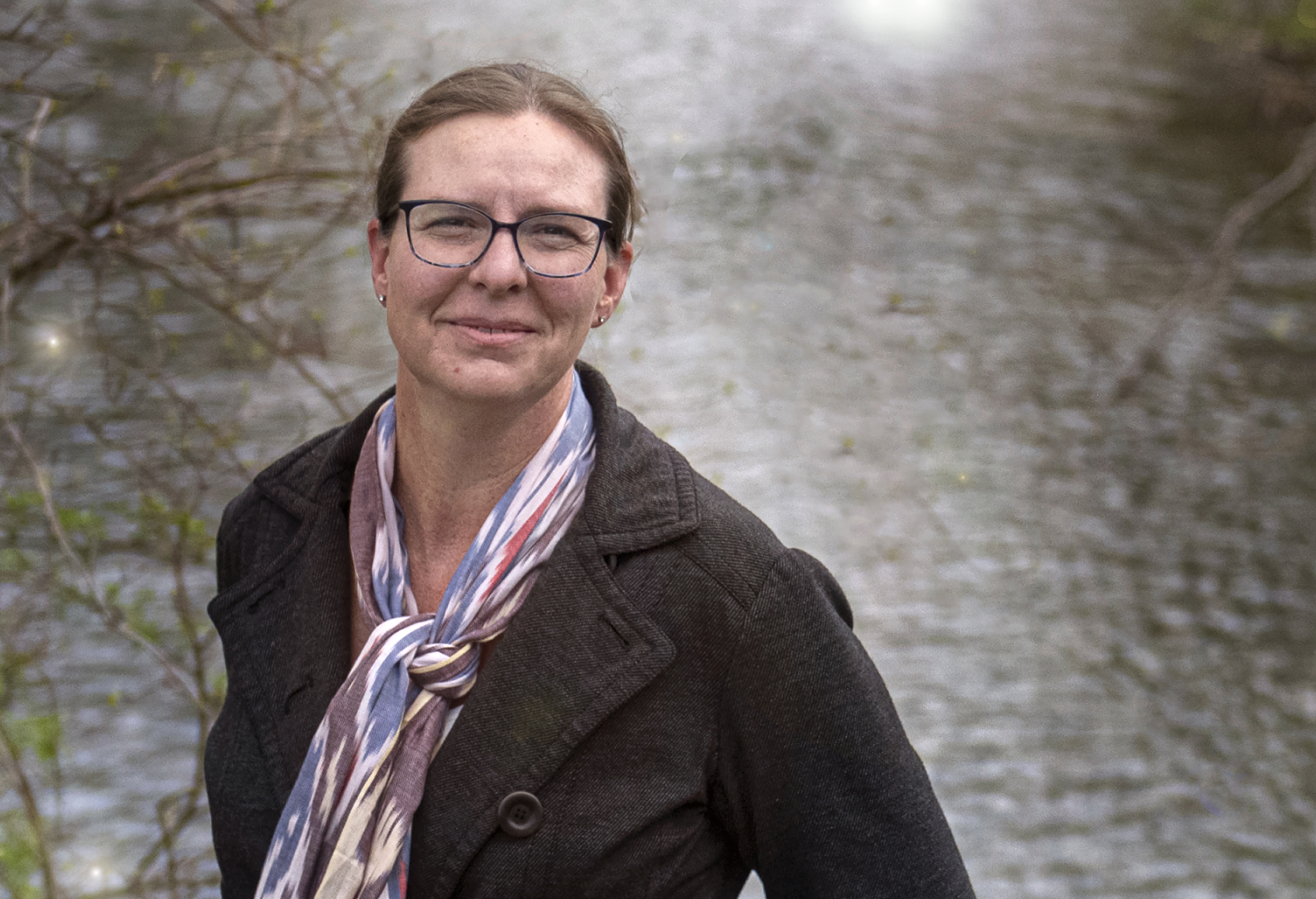 Lara Fowler in front of water