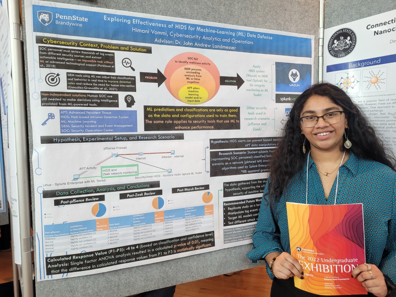 A female students stands in front of a research poster.