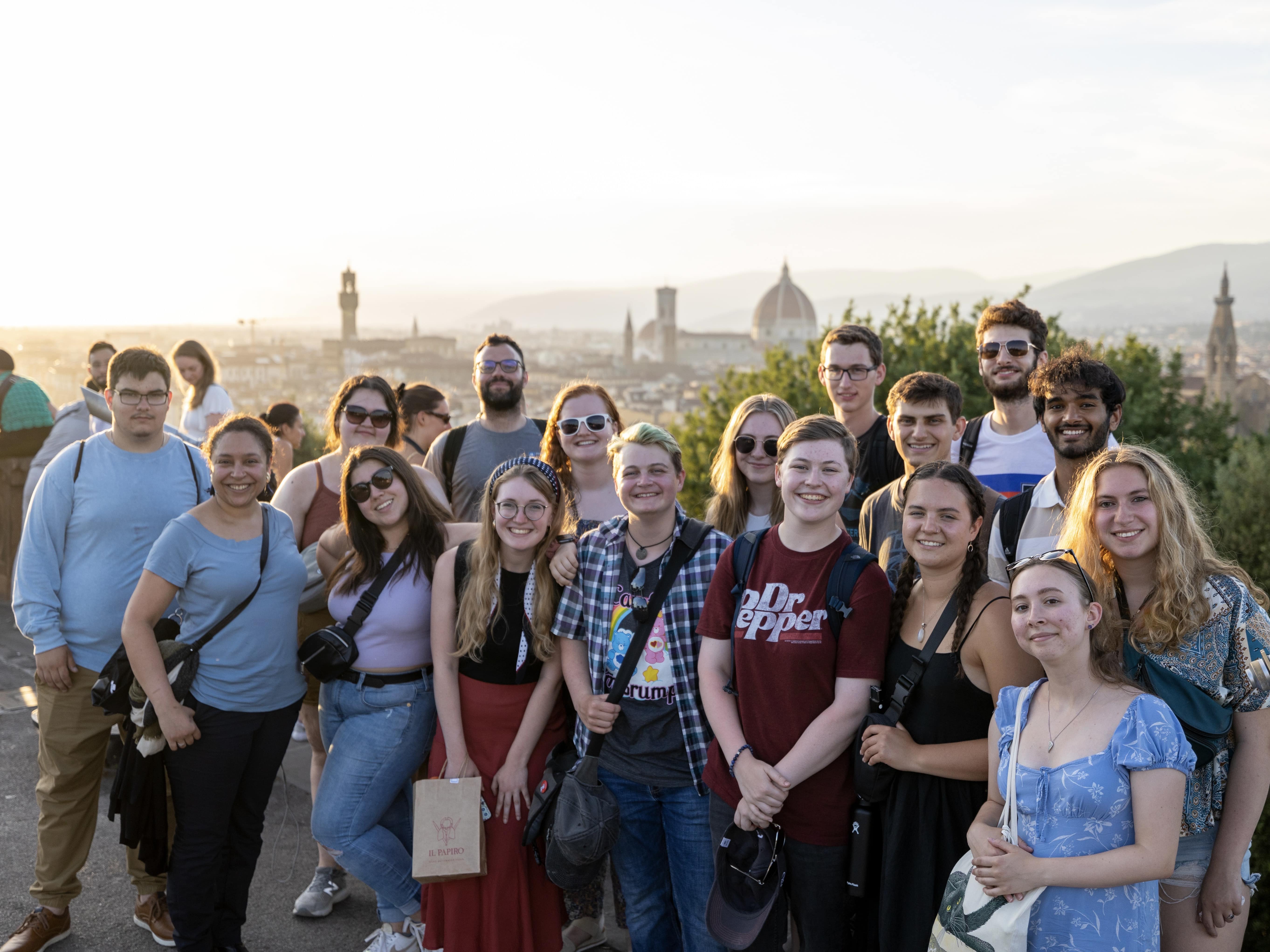 A group of students stands at Piazzale Michelangelo in Florence, Italy