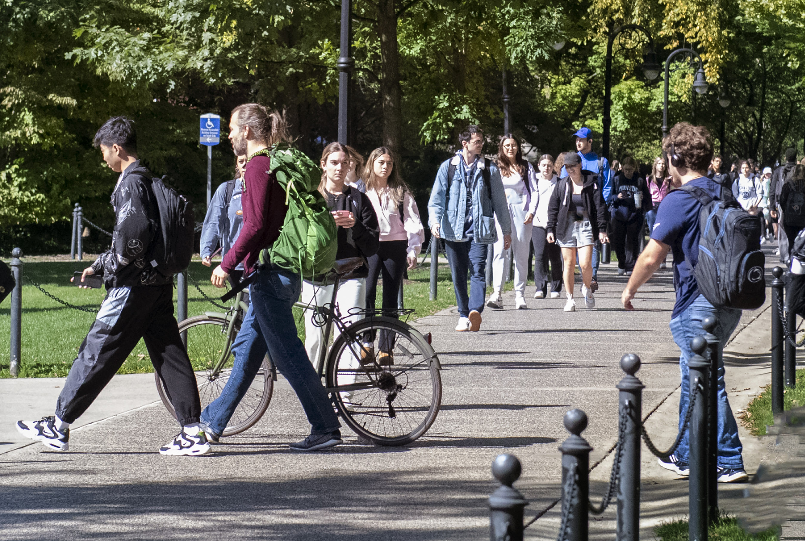 Students walking near Willard Building