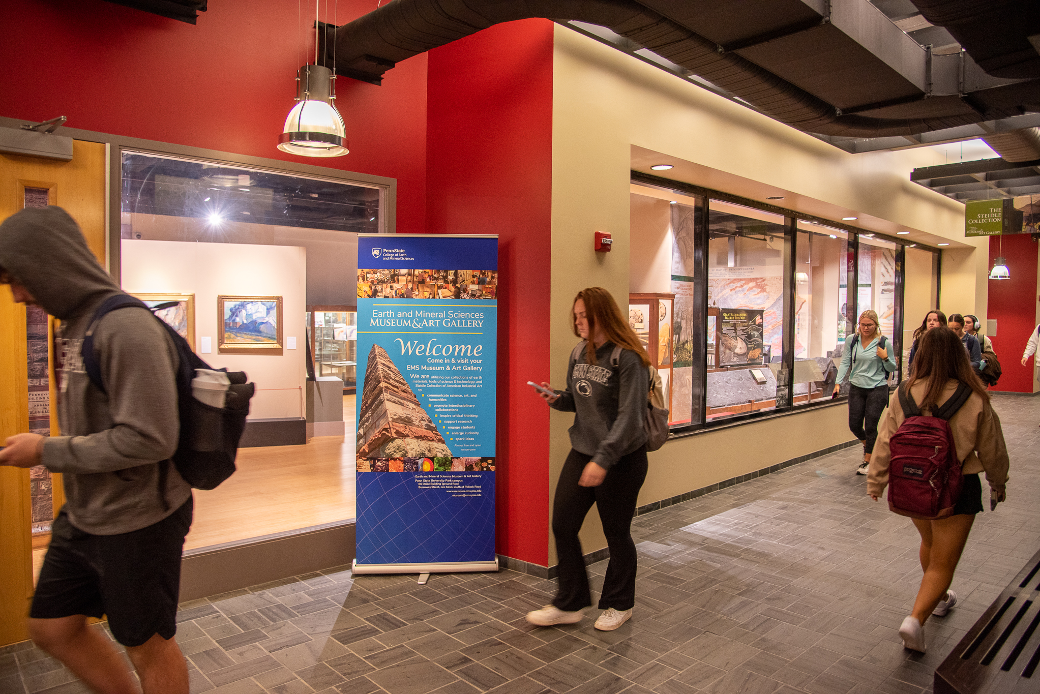 EMS Museum and Art Gallery entrance with people walking in