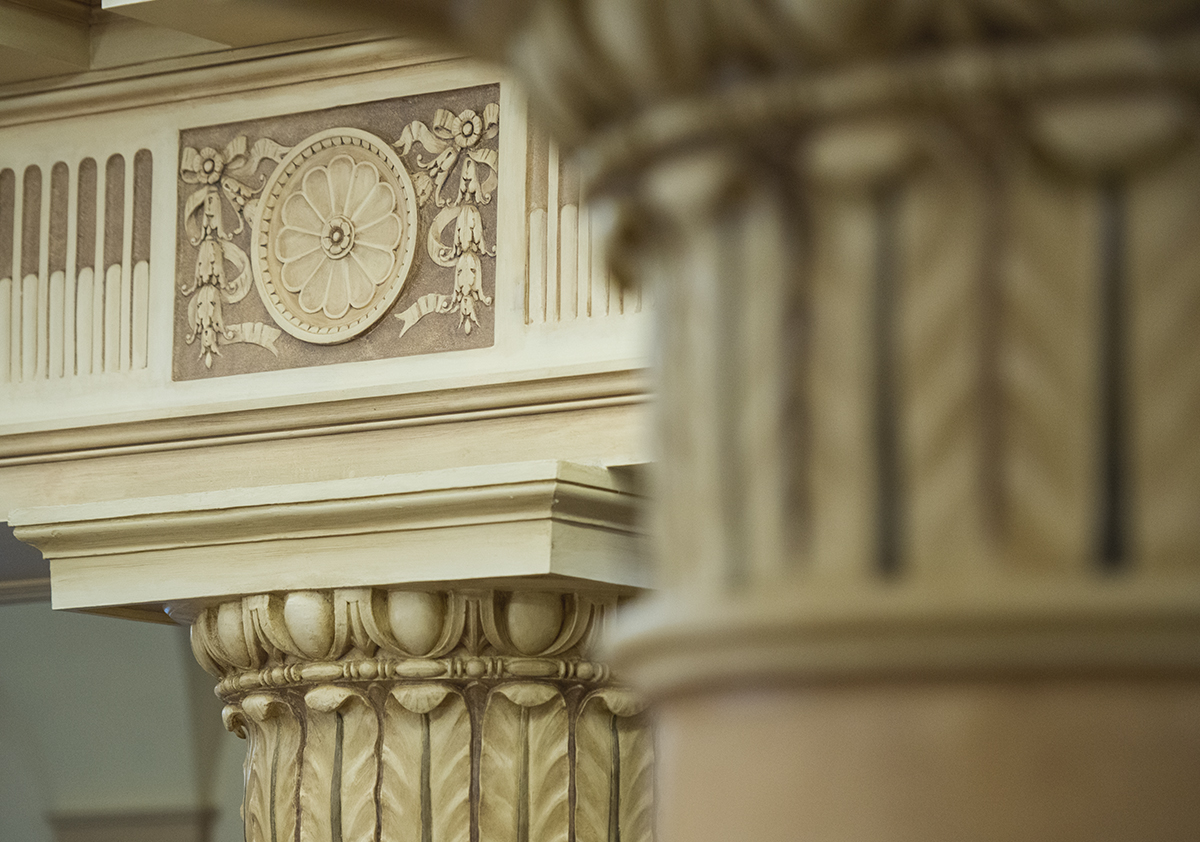 closeup of white, engraved building column