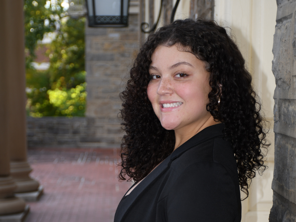 Haley Parker stands in front of Old Main