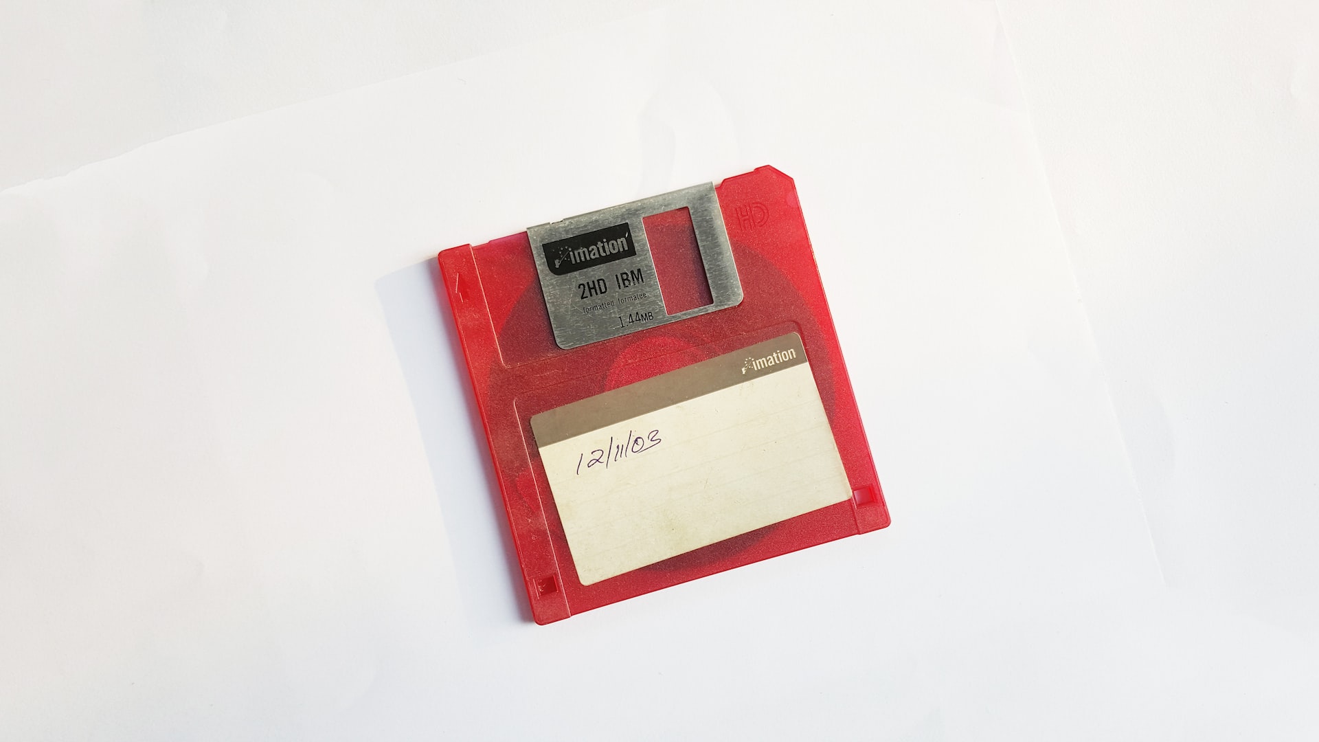 photo of 1.4 megabyte floppy disk with written date 12/11/03