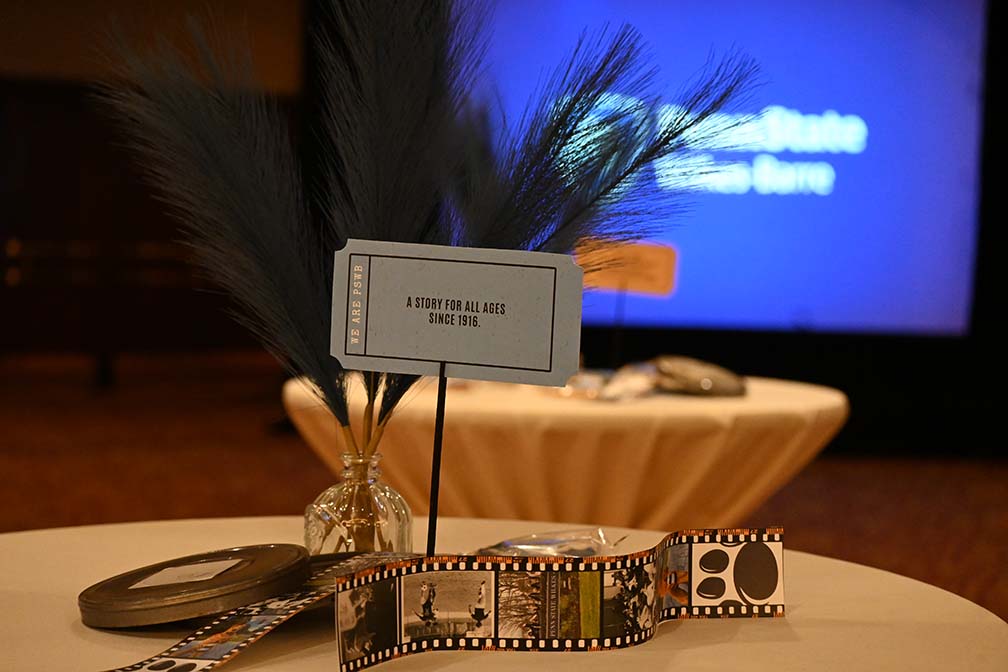 A display on the table of the items designed for the event.