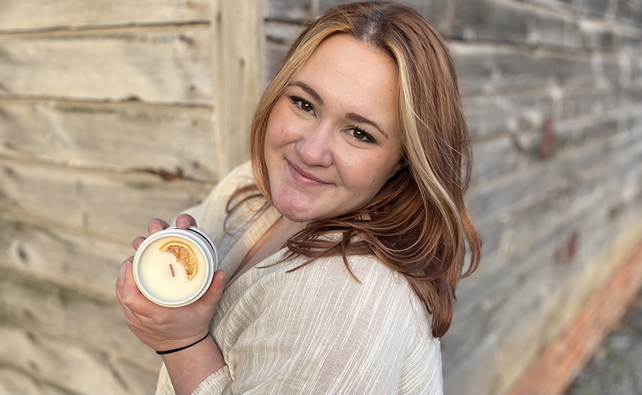 Kelsey Lauer portrait holding a candle