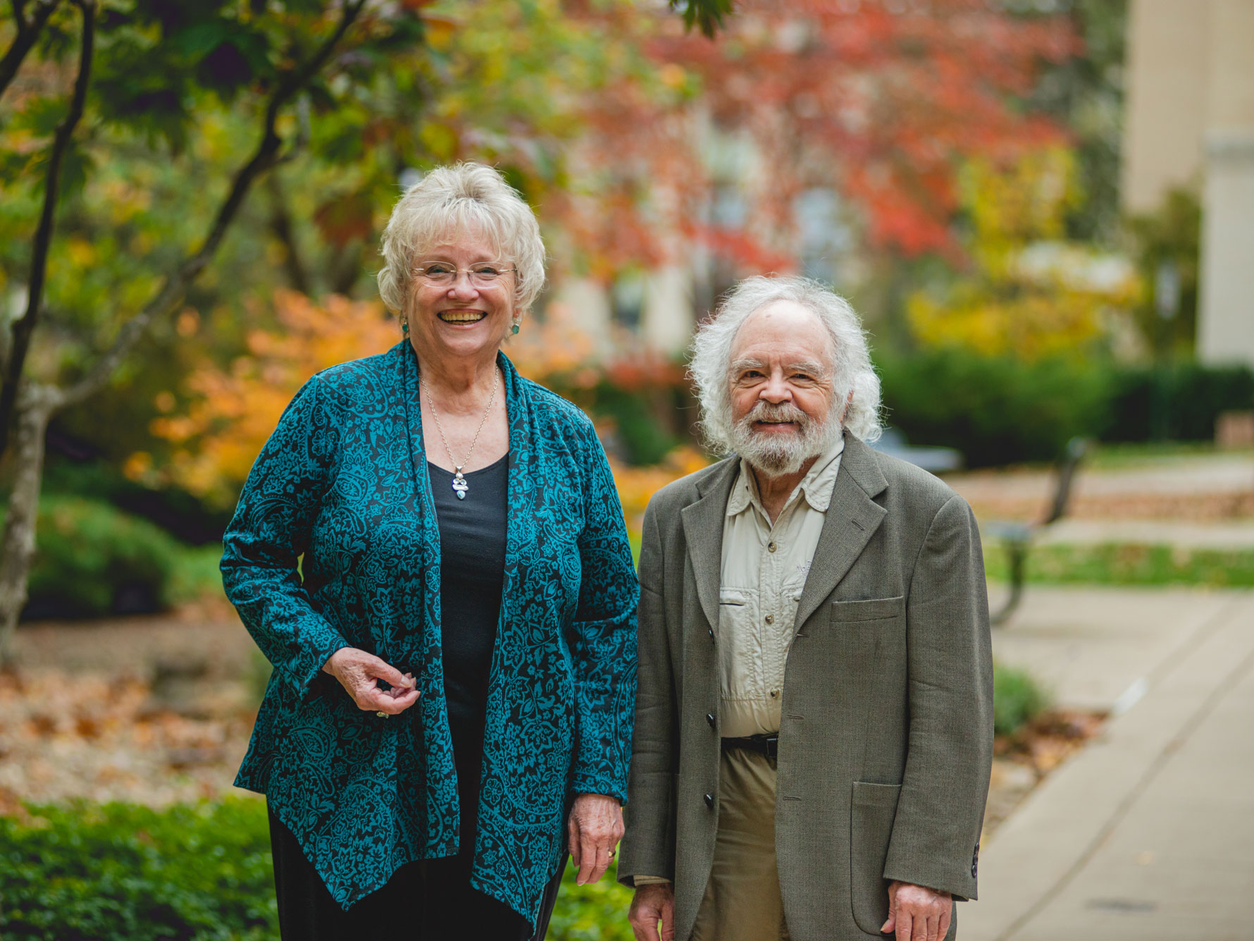 Peggy and Bob Schlegal among fall colors on campus