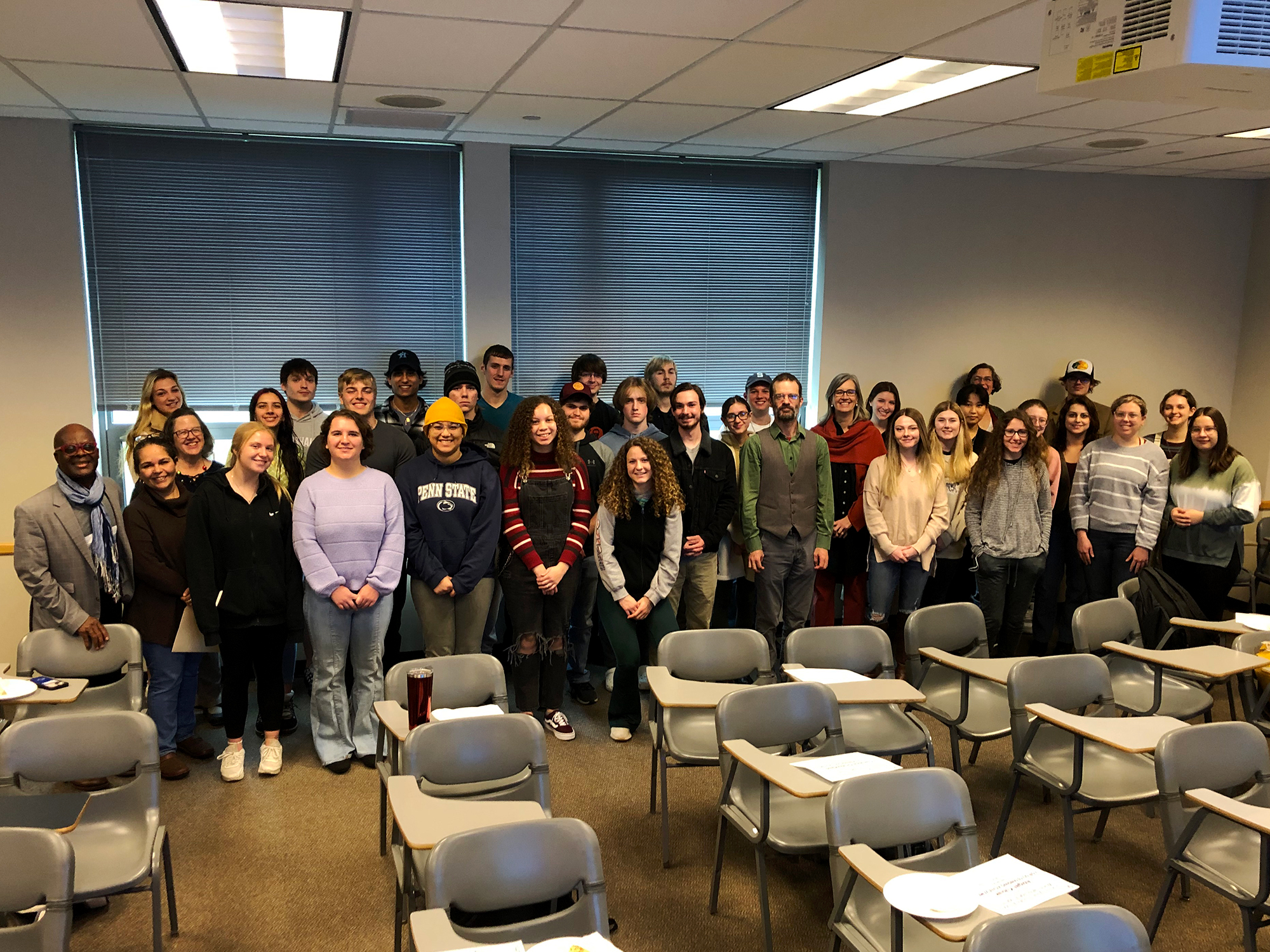 World languages students and faculty pose for a photo at a ceremony recognizing outstanding performance