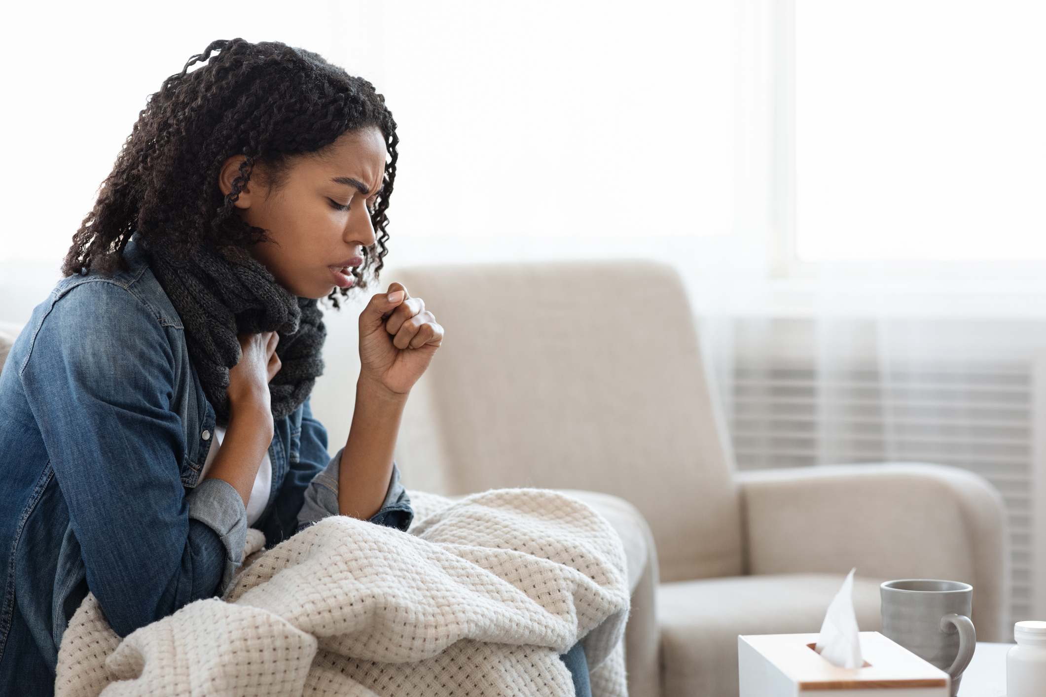 Woman coughing