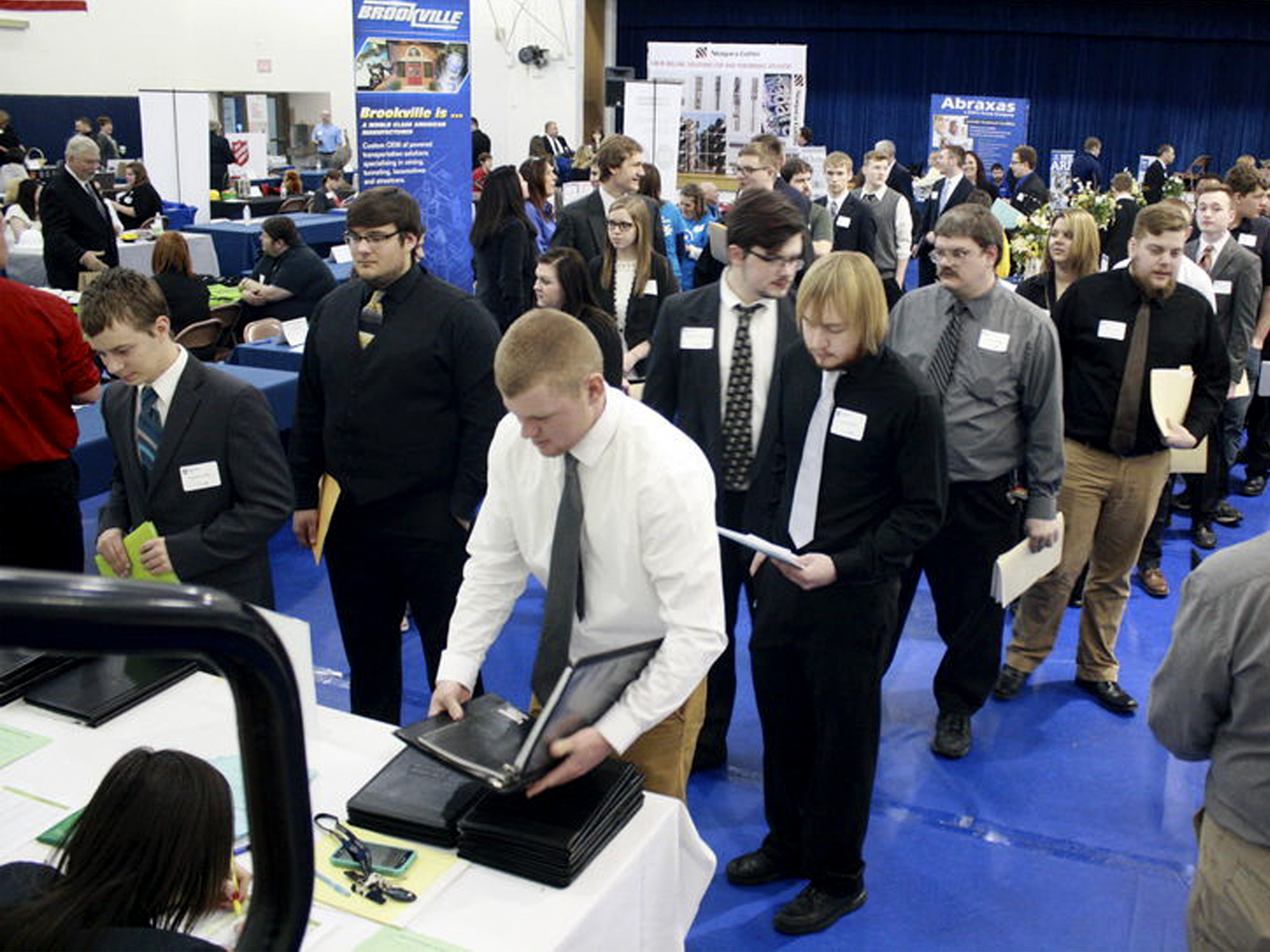 Students, alumni and community members get registered for the career fair at a previous year’s event