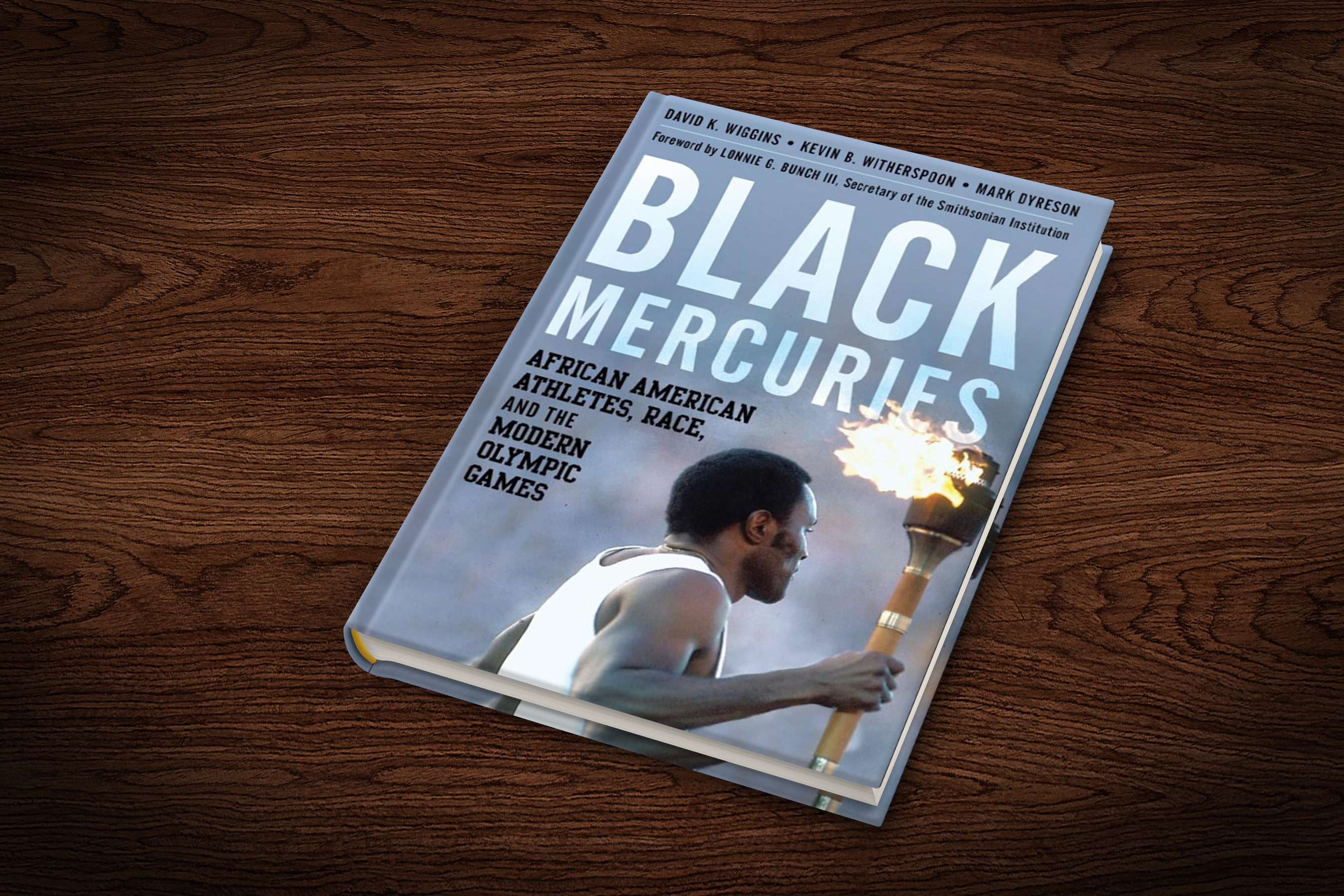 cover of the book Black Mercuries: Afreican American Athletes, Race, and the Modern Olympic Games