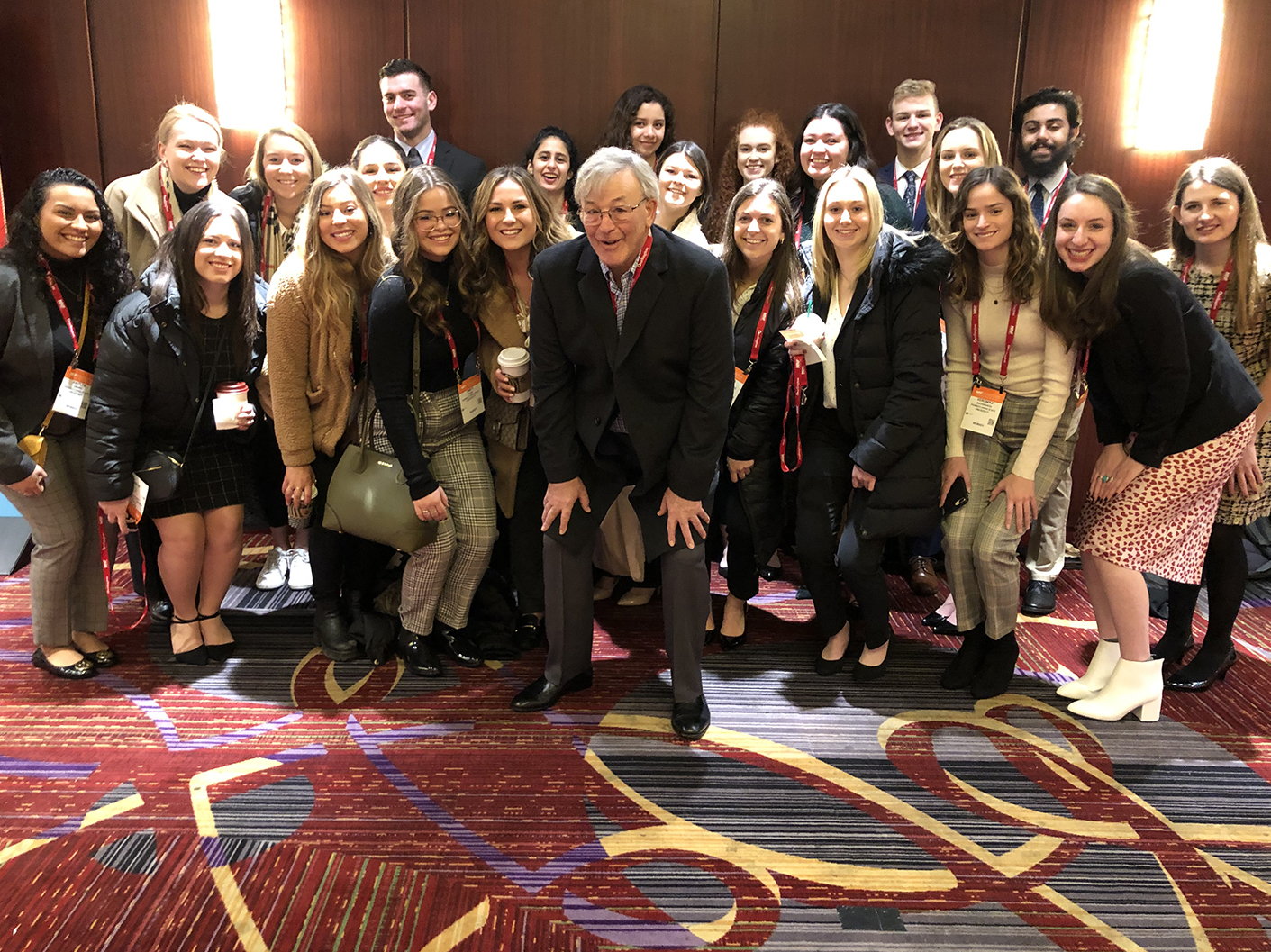 A photo of Fred Hurvitz with a group of Smeal students.