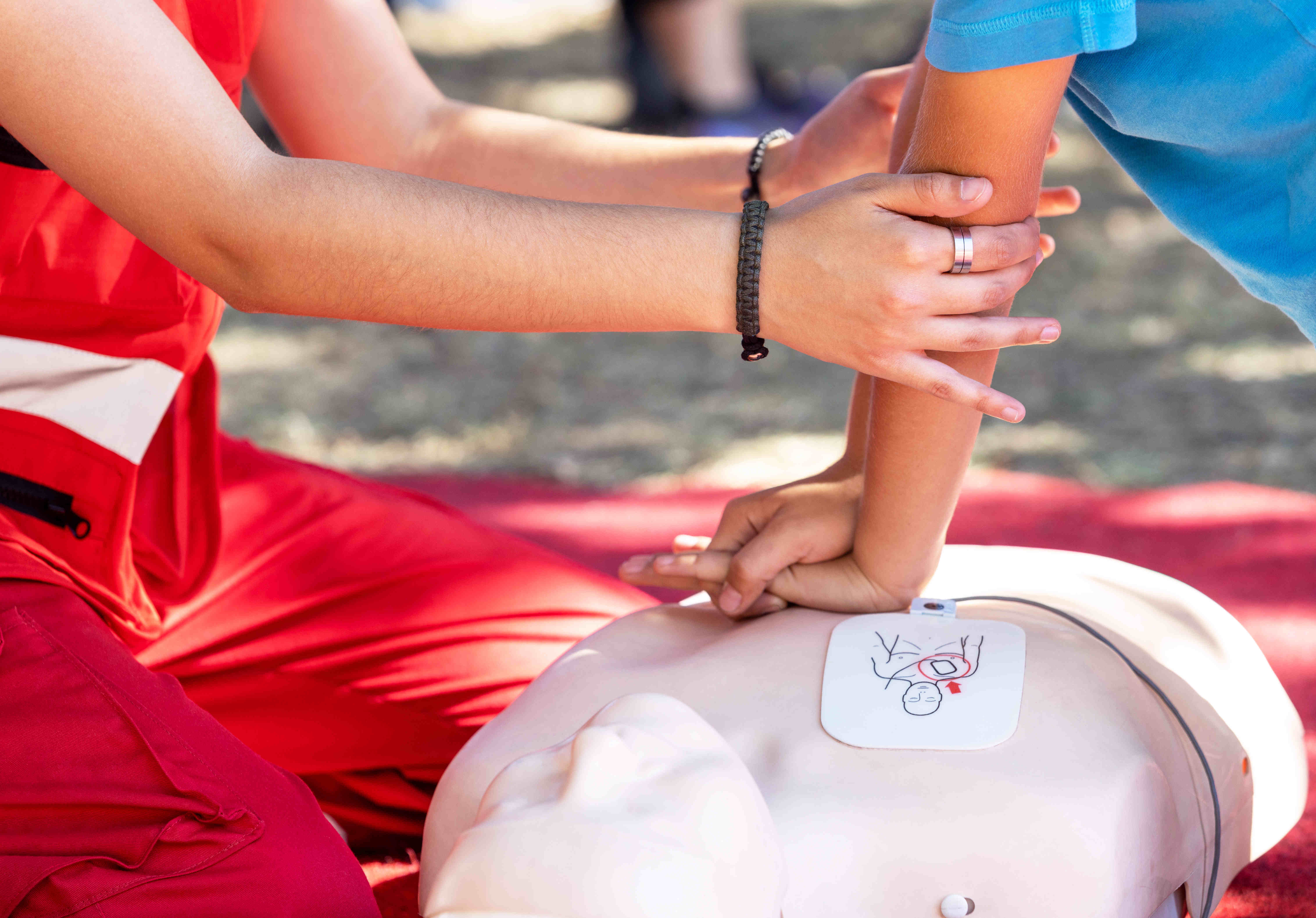 First Aid and CPR training using a mannequin.