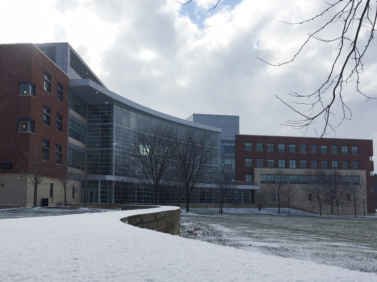 A picture of the Business Building with snow on the ground.