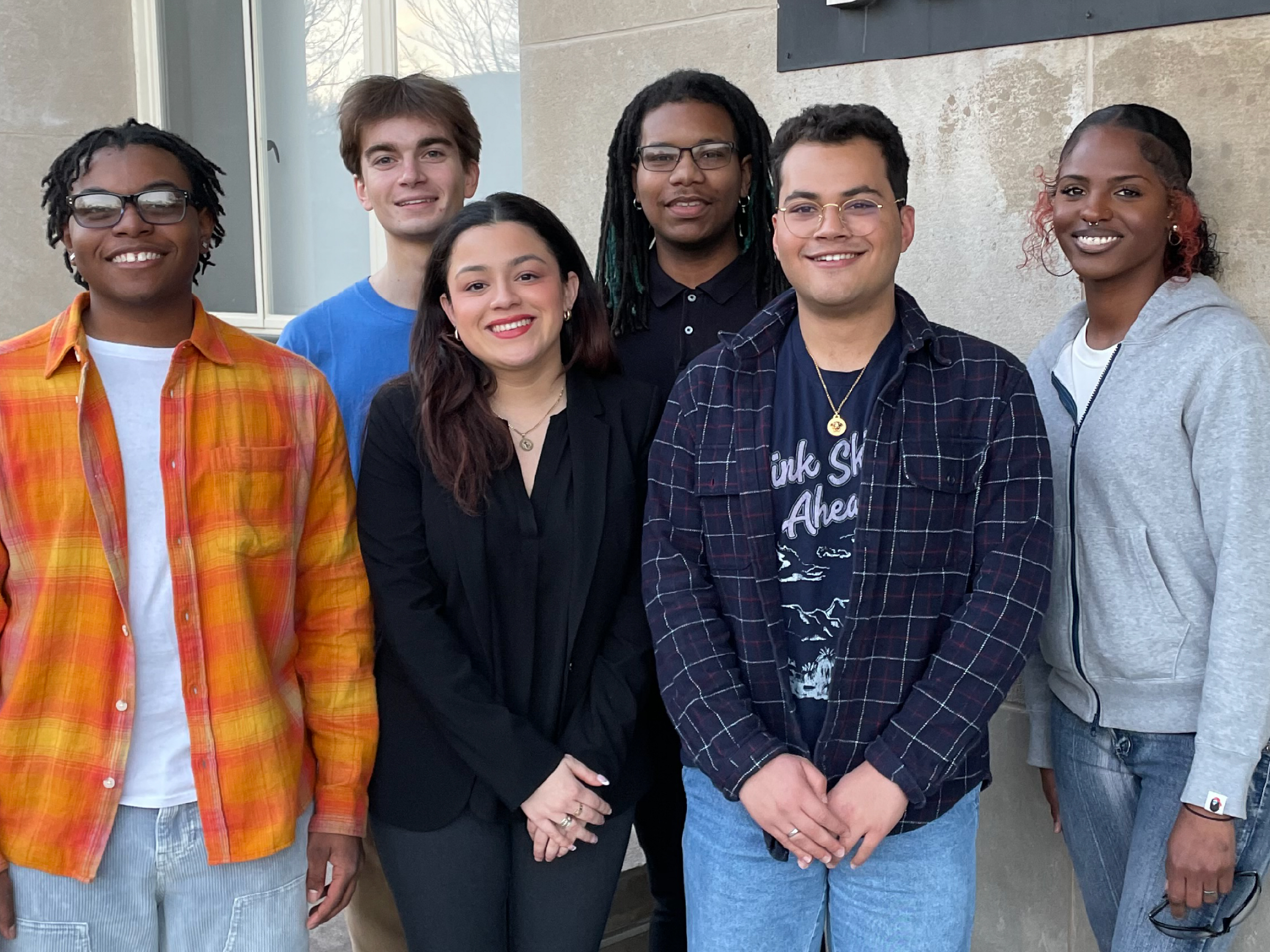 Members of Students United Against Poverty pose together after a meeting