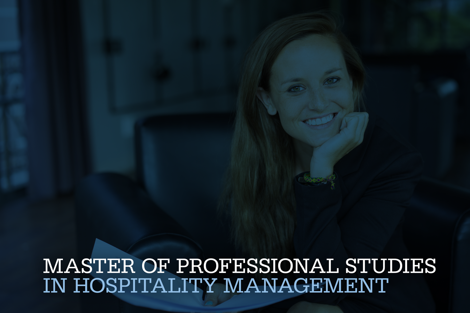 Master of Professional Studies in Hospitality Management; woman smiling with hand on chin