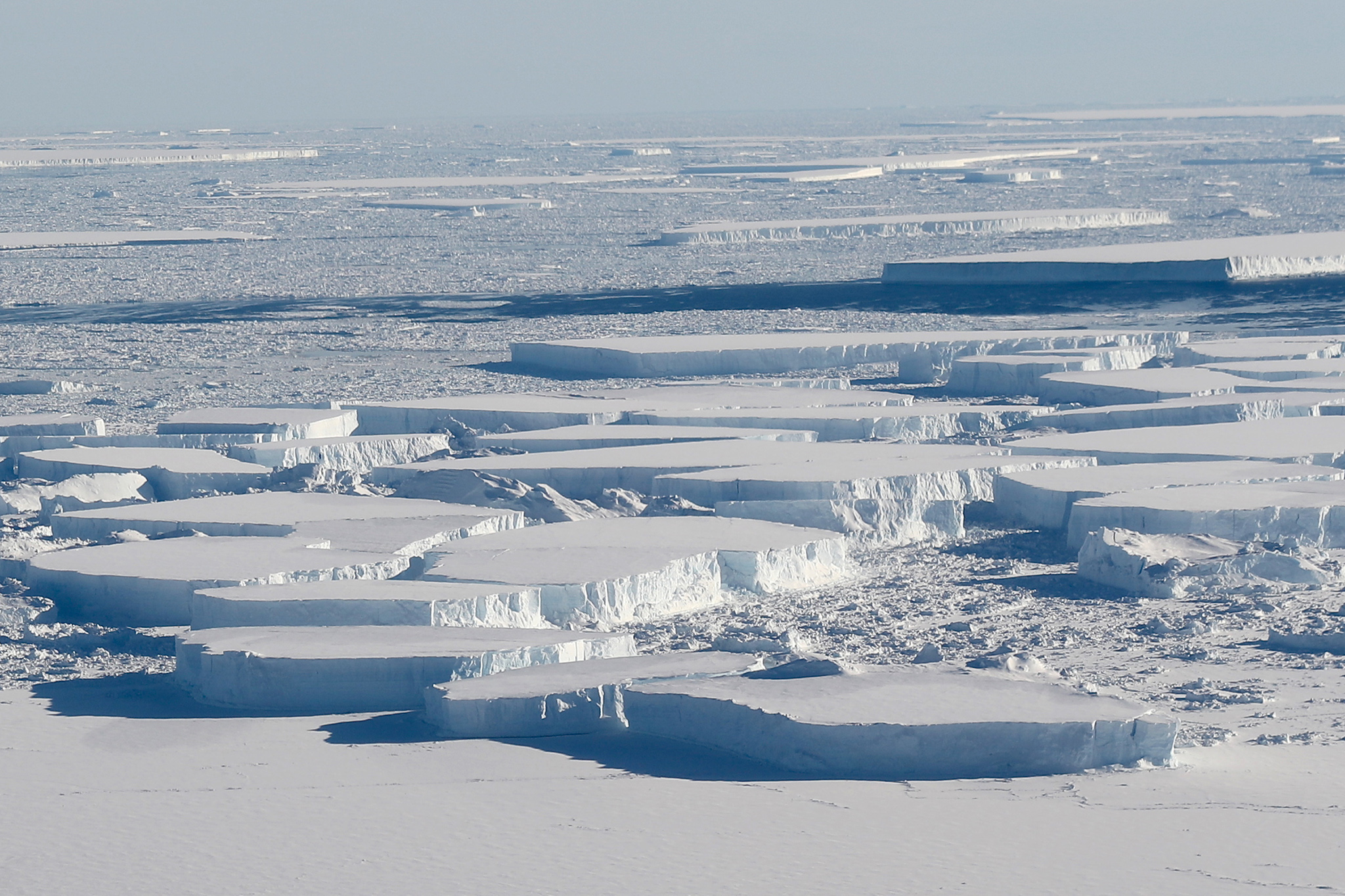 Icebergs that have broken off an ice shelf in Antarctica 