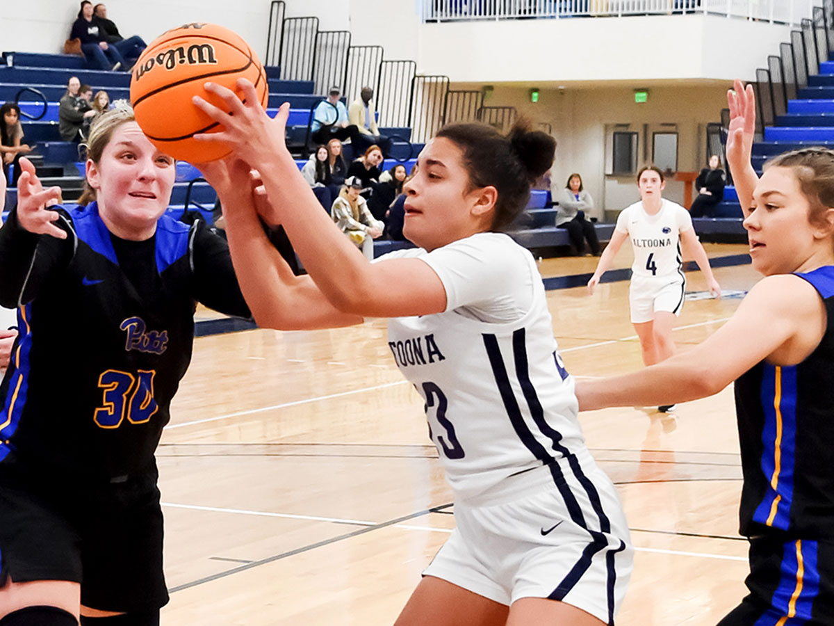 Avana Sayles playing basketball