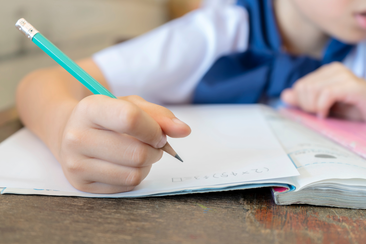 Student working on math calculations.