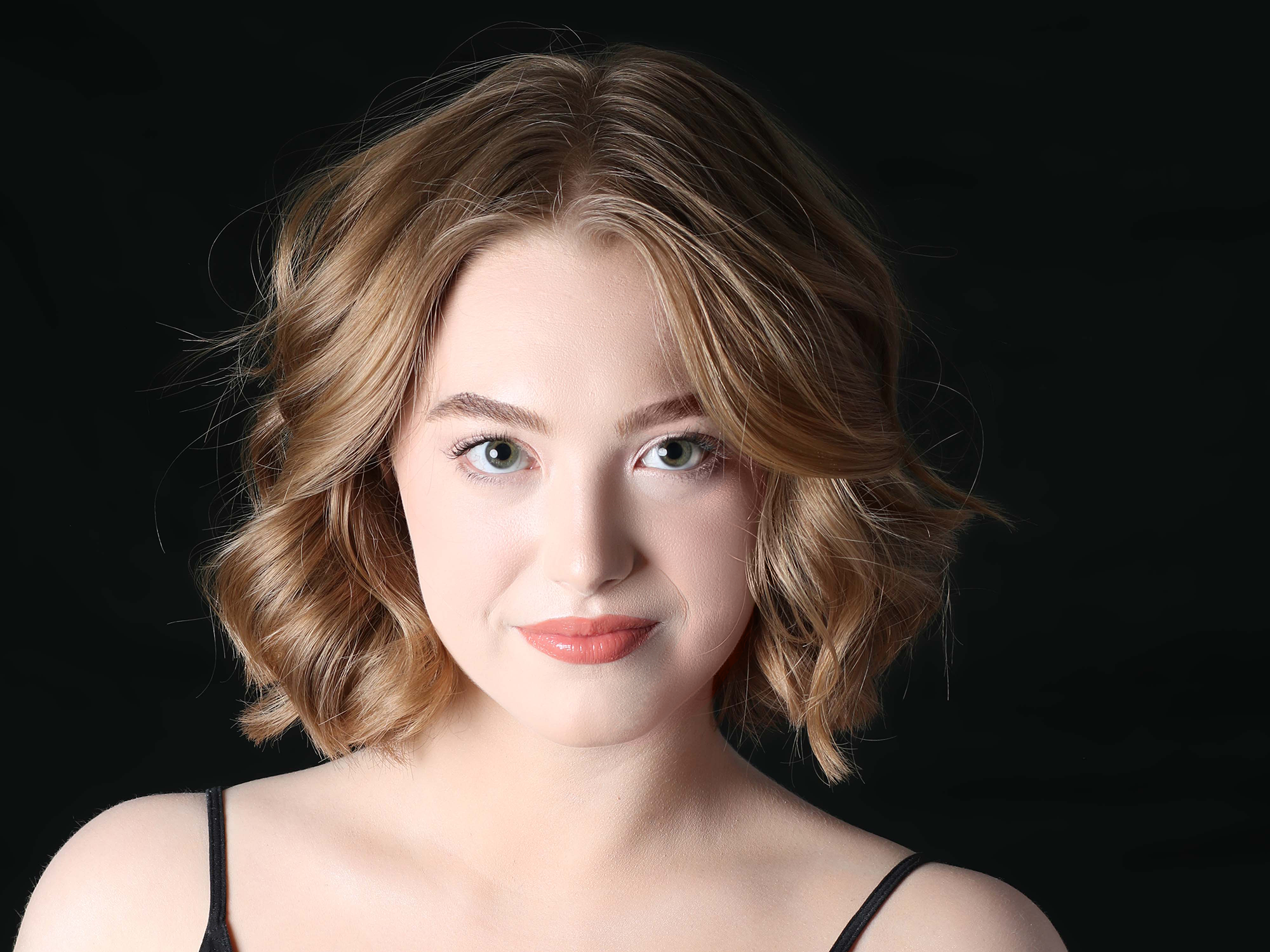 Clara Bradley, a second-year student double majoring in political science and criminology, poses for a professional headshot.