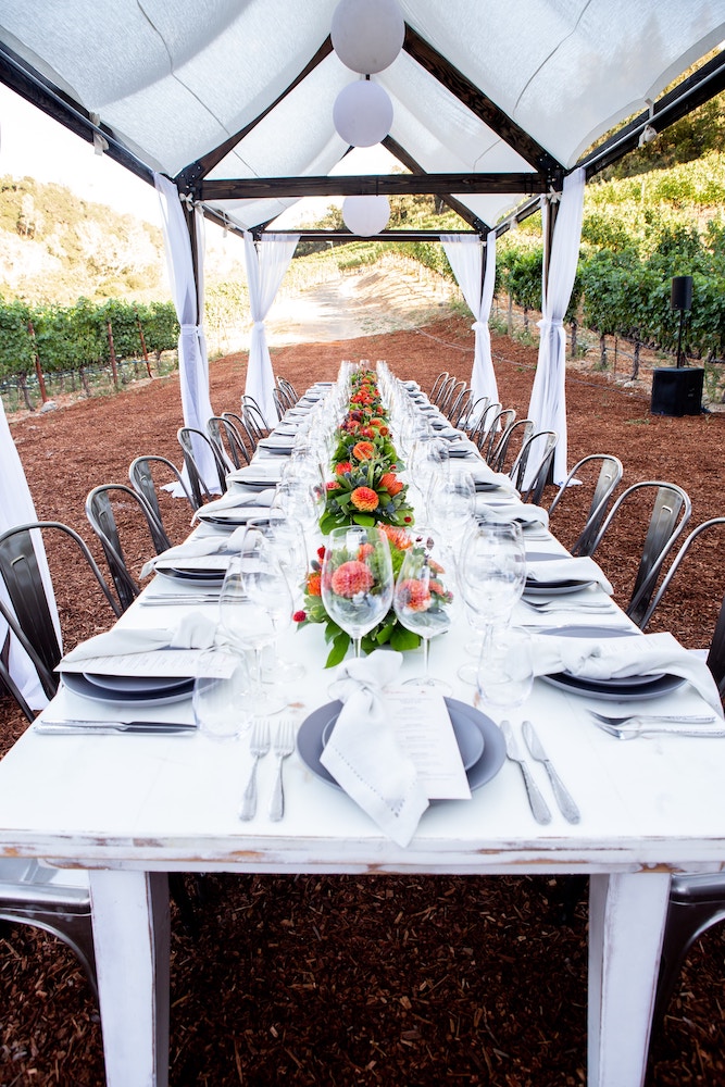 dining table set up outdoors at a winery