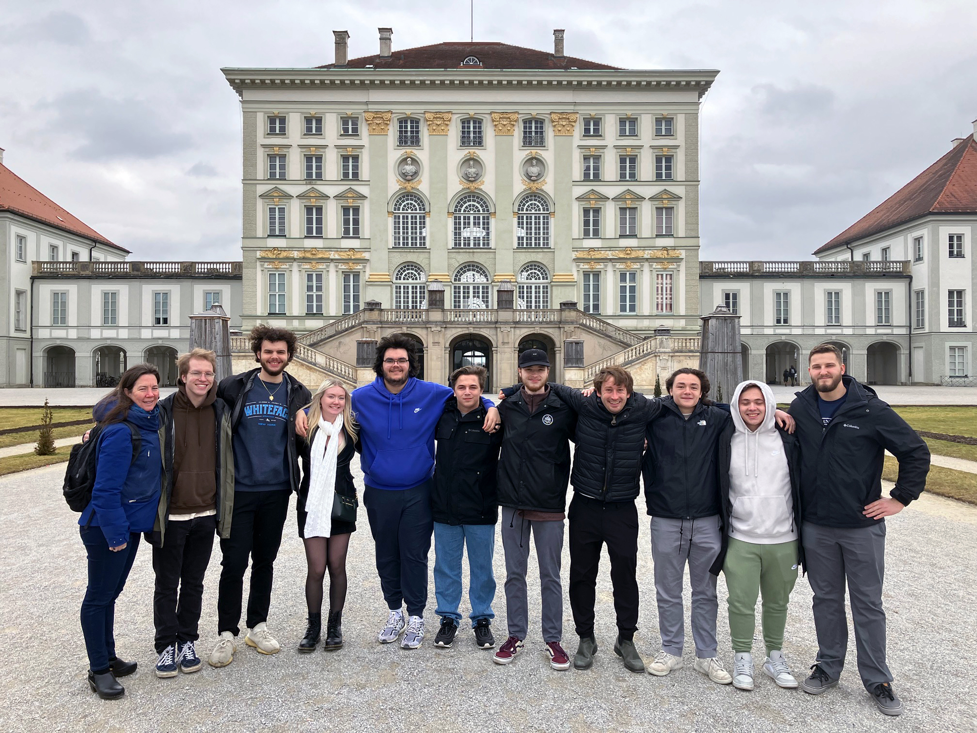 Penn State students pose for a photo in front of the gardens of Nymphenburg Palace in Munich, Germany.