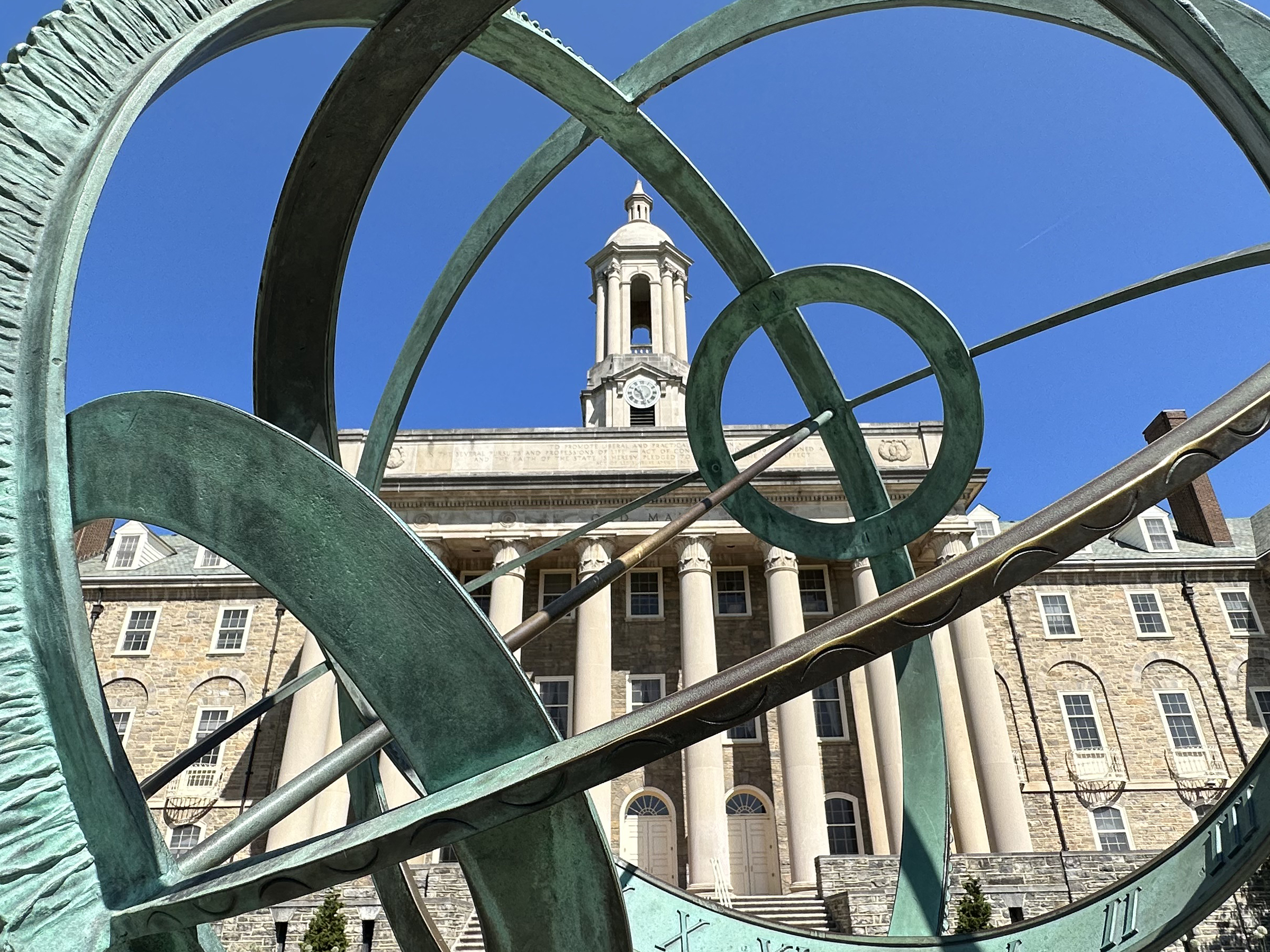 Old Main viewed through Armillary Sphere