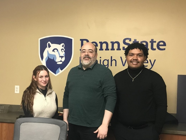 PSU-LV students Gianna Gomes and Fernando Gaton Bido with Dr. Anibal Torres