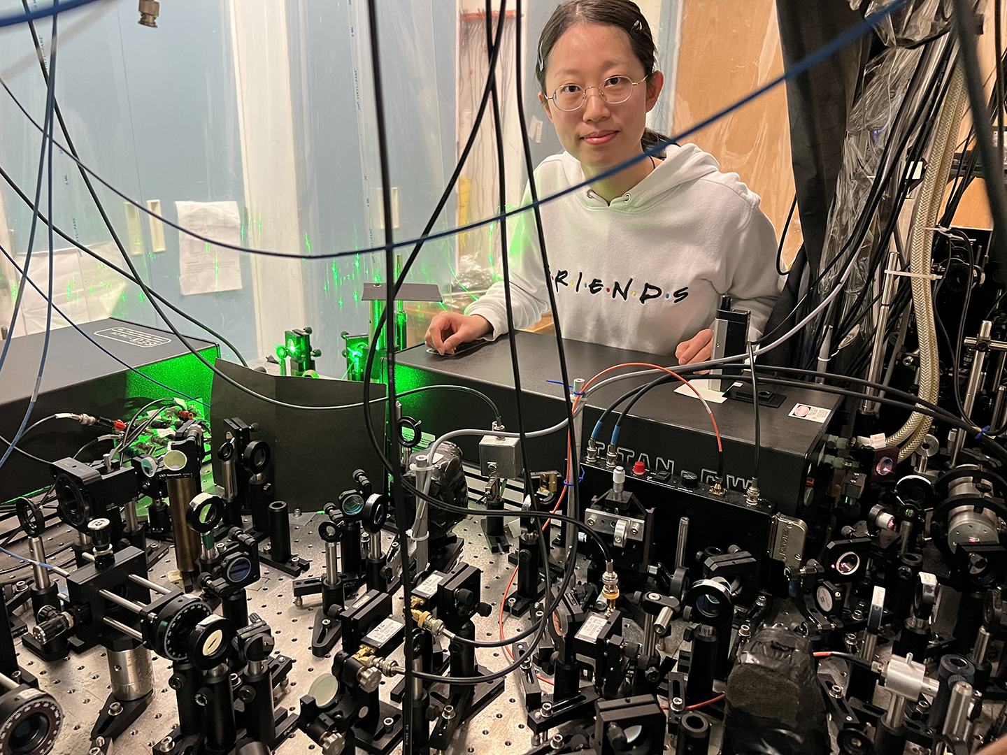 Penn State graduate student Yuan Le in physics lab