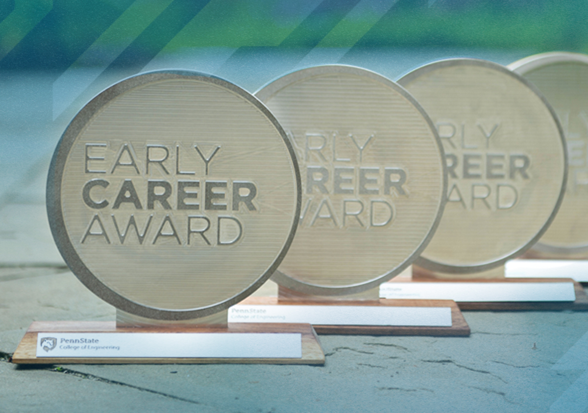 A display of four plaques that each read "Early Career Award"