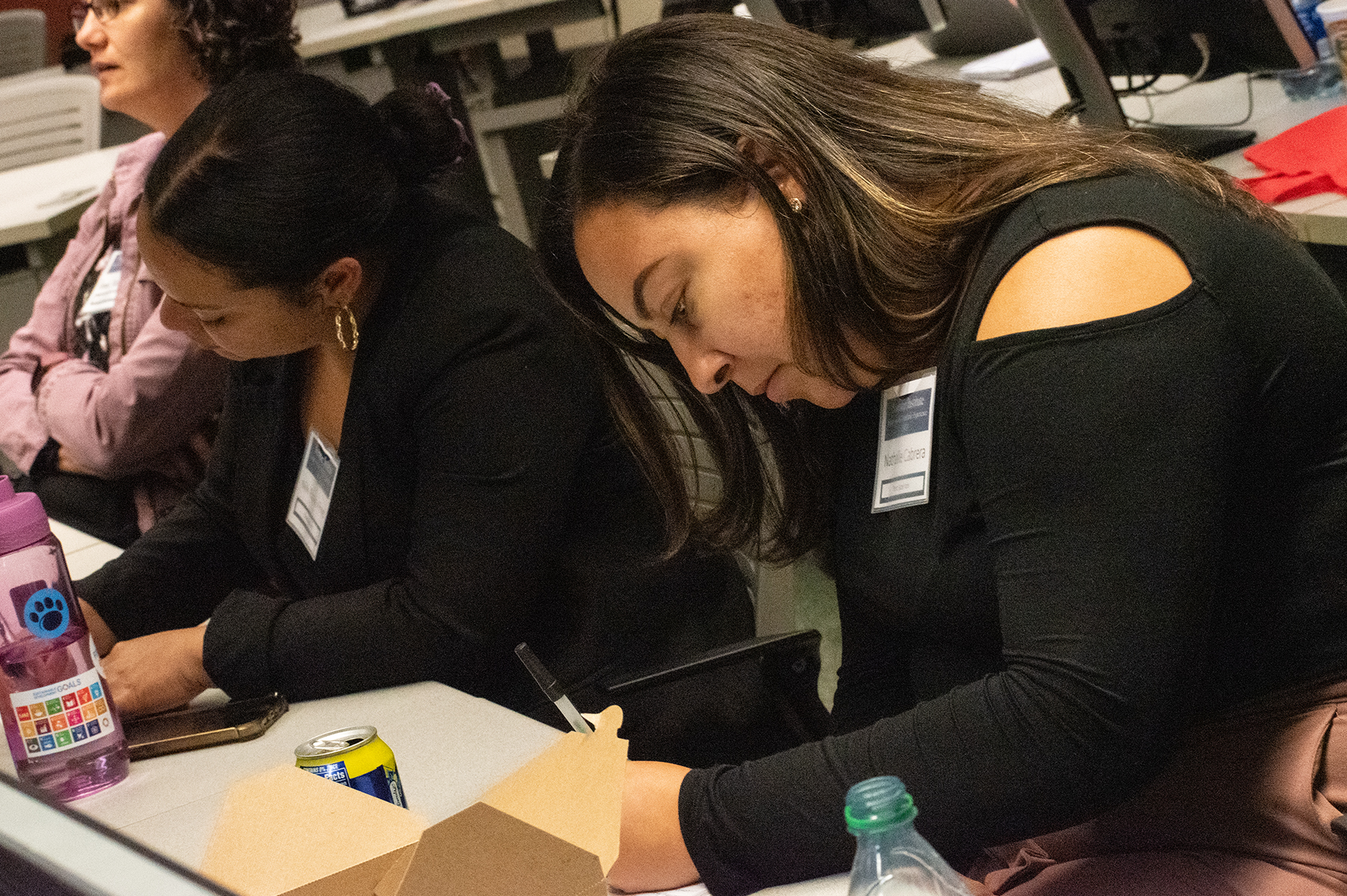 People collaborating on a project at a table