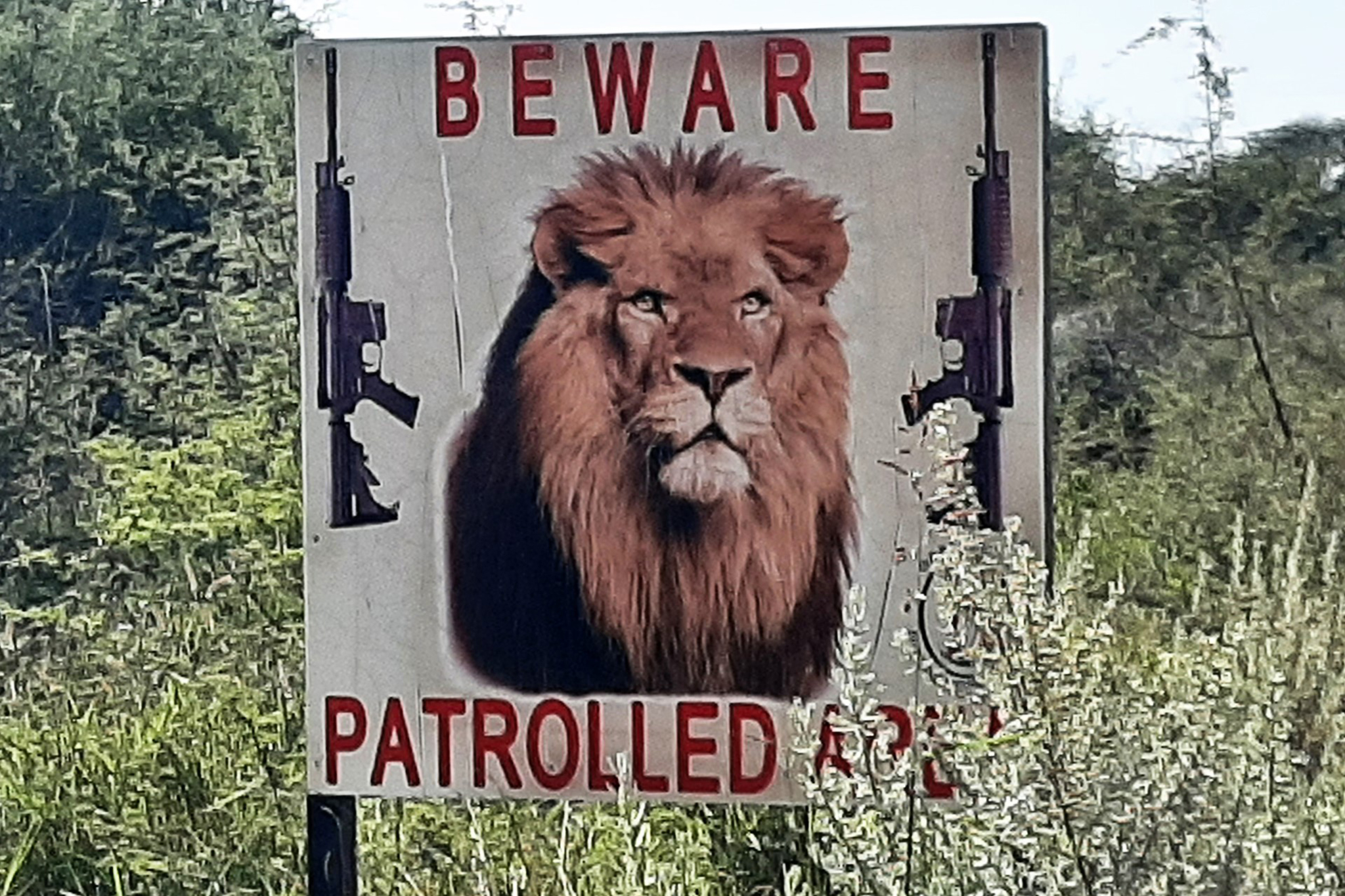 A warning sign to poachers in a wildlife protected area in Africa 