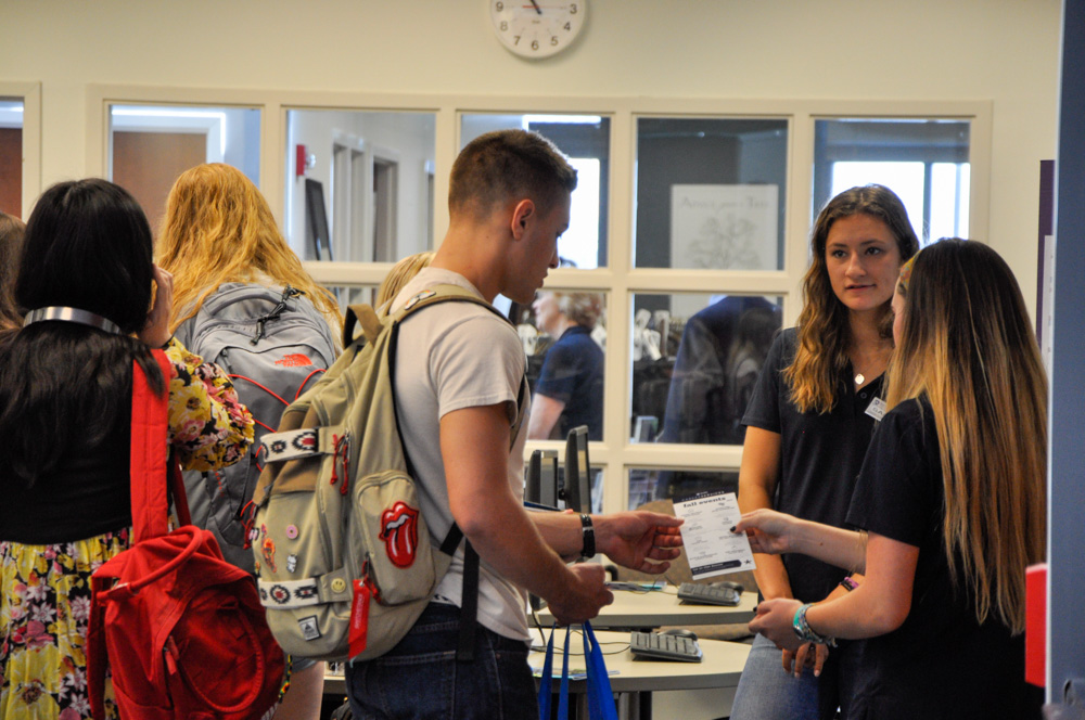 Students chat with each other during the Career Services open house event