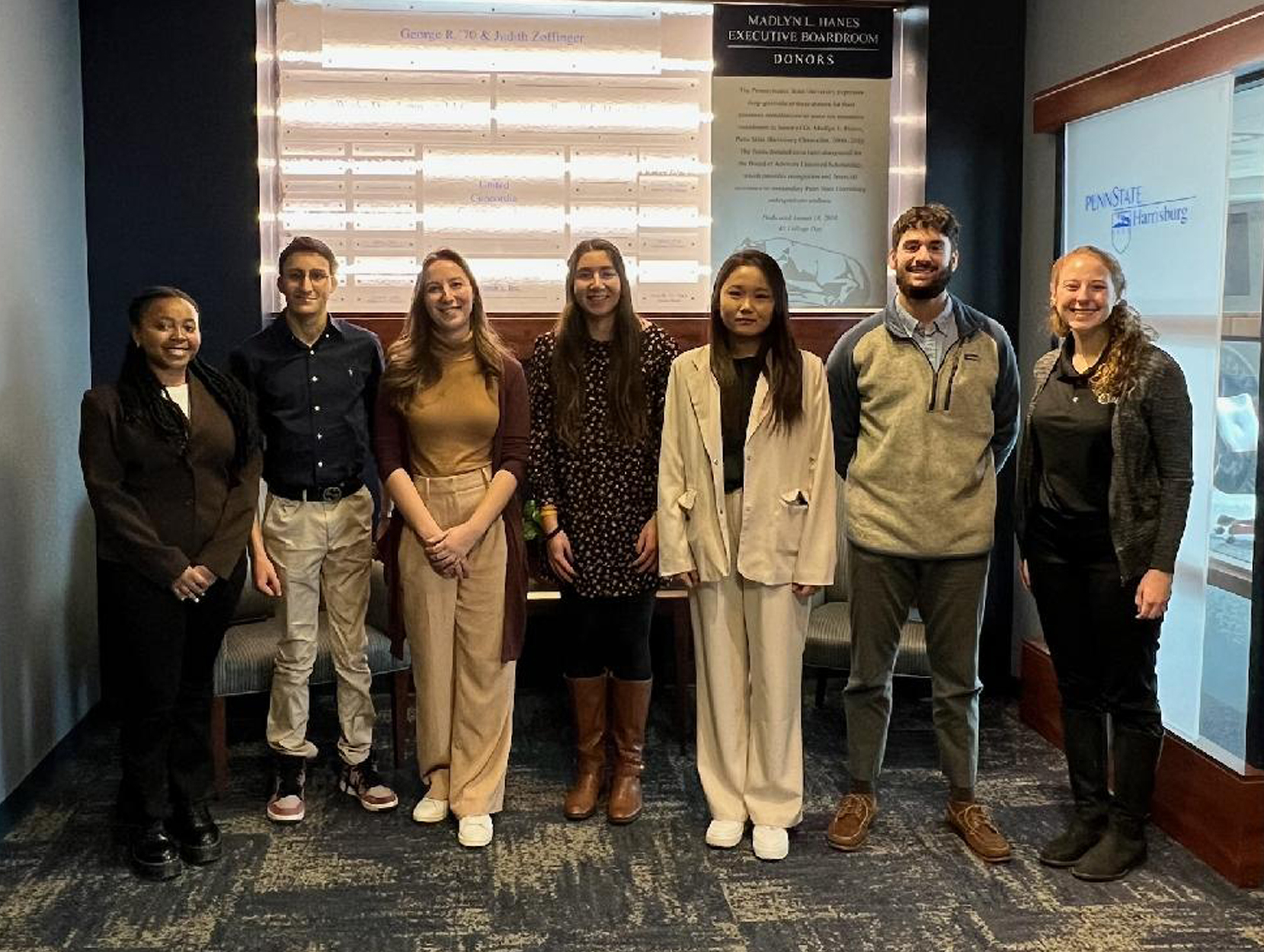 Group photo of students and Clark Associates representatives